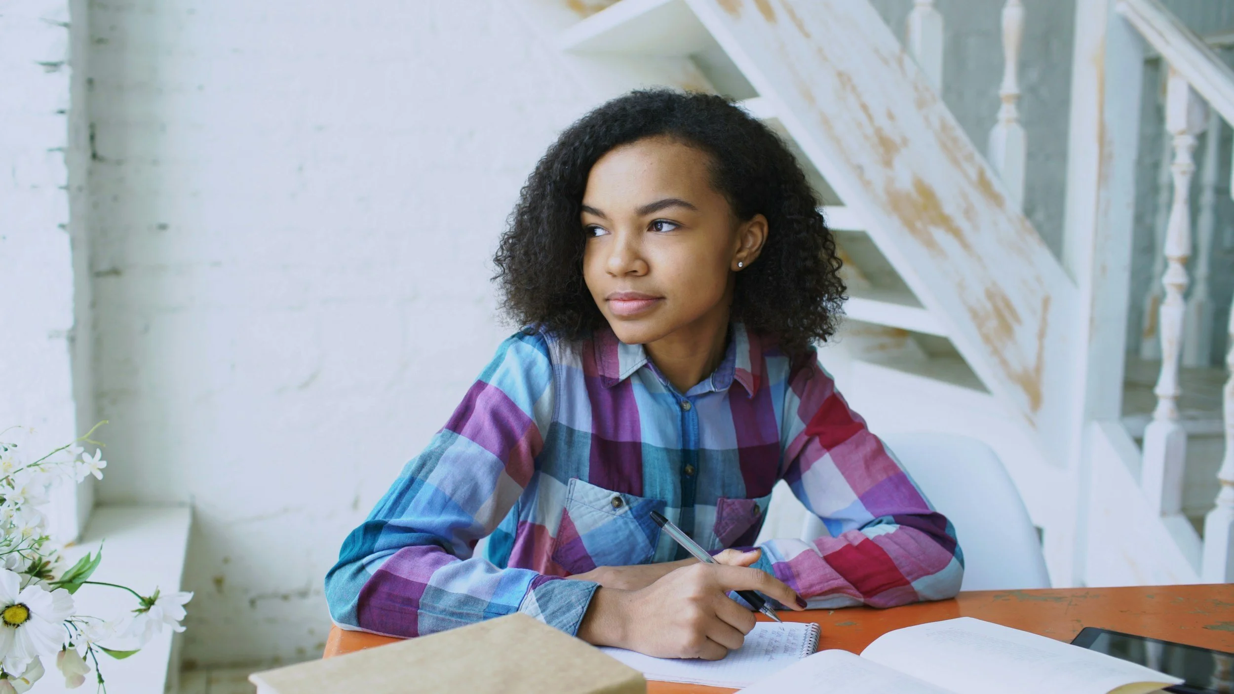 High school senior reflecting on future career goals while exploring college majors and planning for life after graduation.