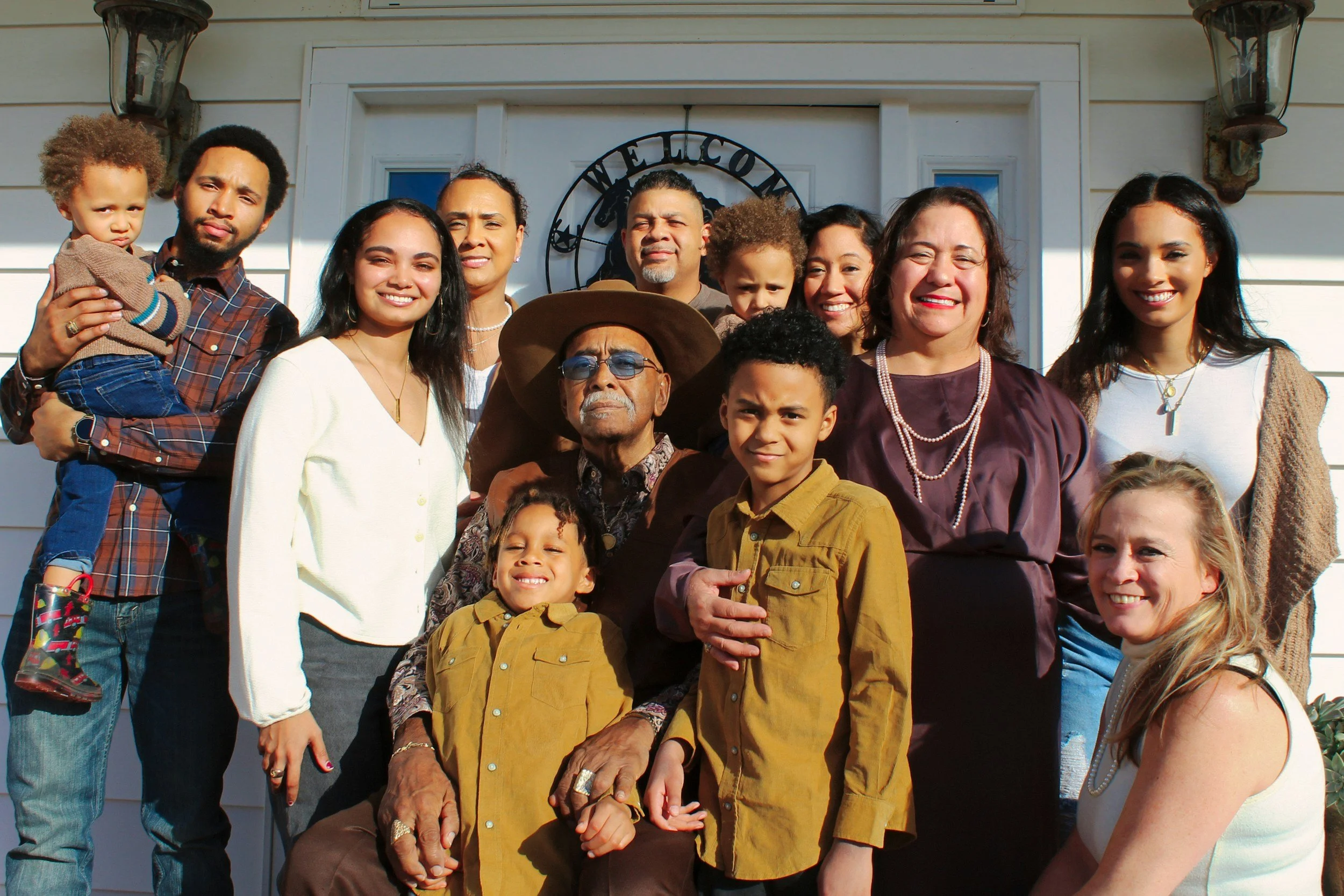 A multigenerational family gathered together outdoors, representing the balance of maintaining meaningful family relationships while honoring healthy boundaries and personal well-being.