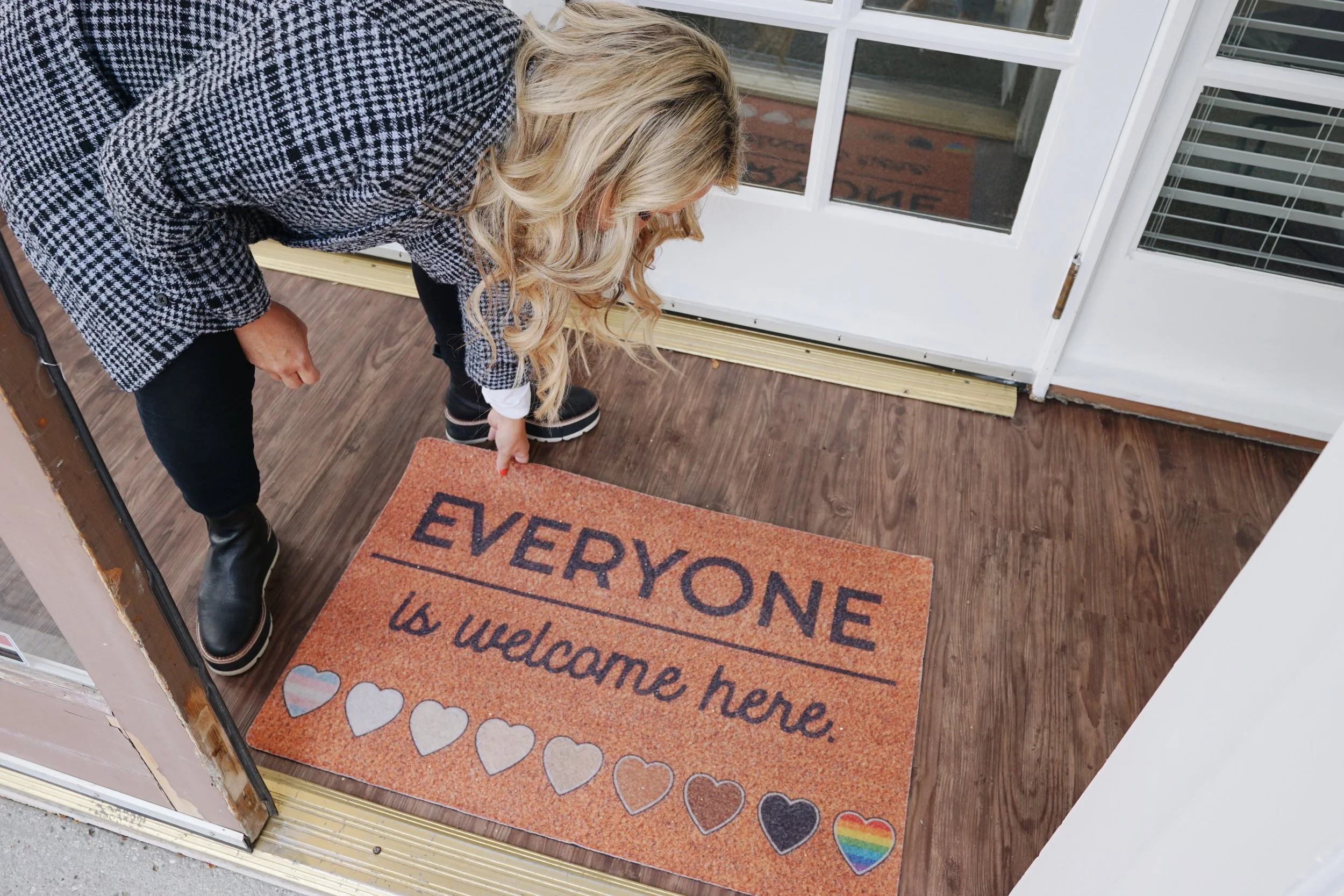Welcome mat at Wasatch Family Therapy reading "Everyone is welcome here," representing an inclusive, LGBTQ-affirming, and supportive therapy environment.