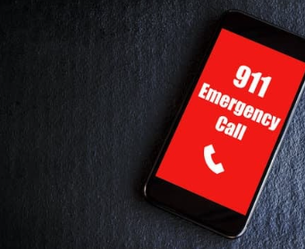 stock image of a cell phone calling 911 for emergency