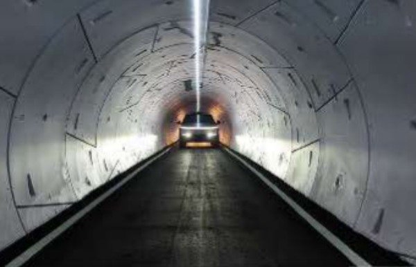 vehicle driving down tunnel