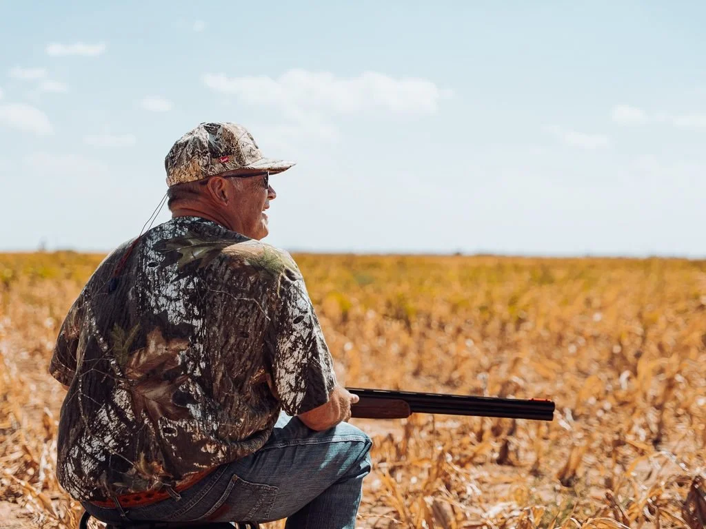 100 Club Dove Hunt Man in field hunting