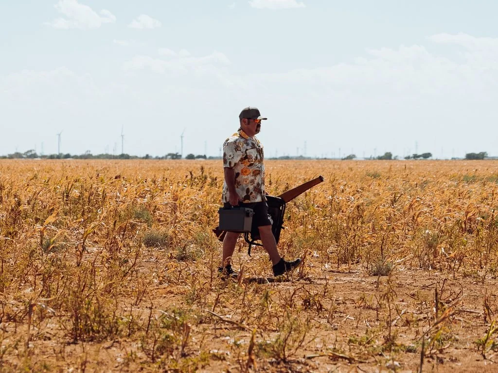 100 Club Dove Hunt Man in field hunting
