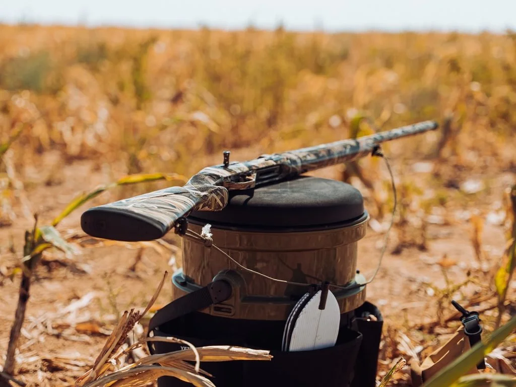 100 Club Dove Hunt gun in field