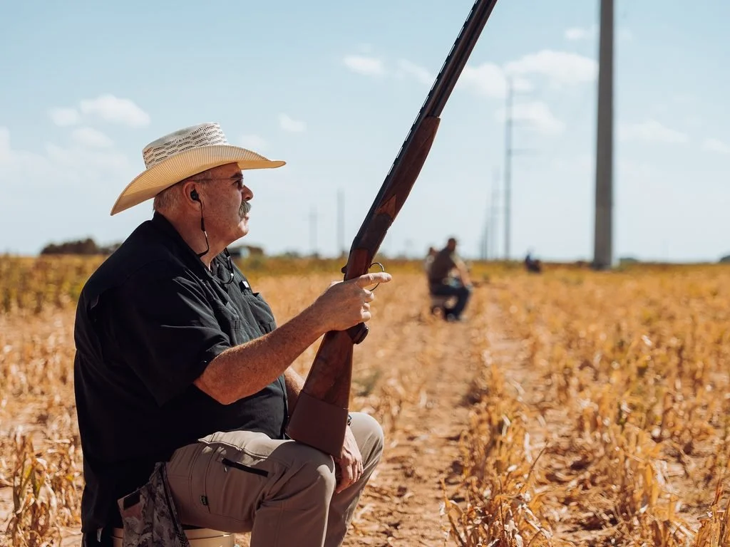 100 Club Dove Hunt Man in field hunting