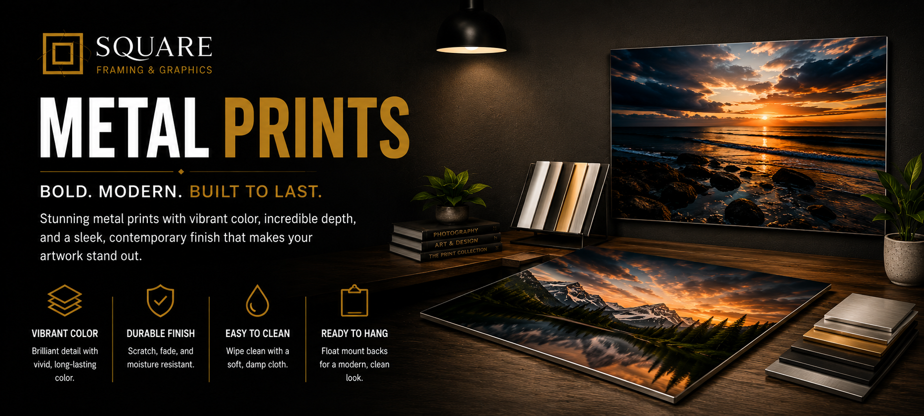 Advertisement for square framing and graphic prints showcasing metal prints with sunset landscape images, displayed on a wooden table with decorative items and books in a modern interior setting.