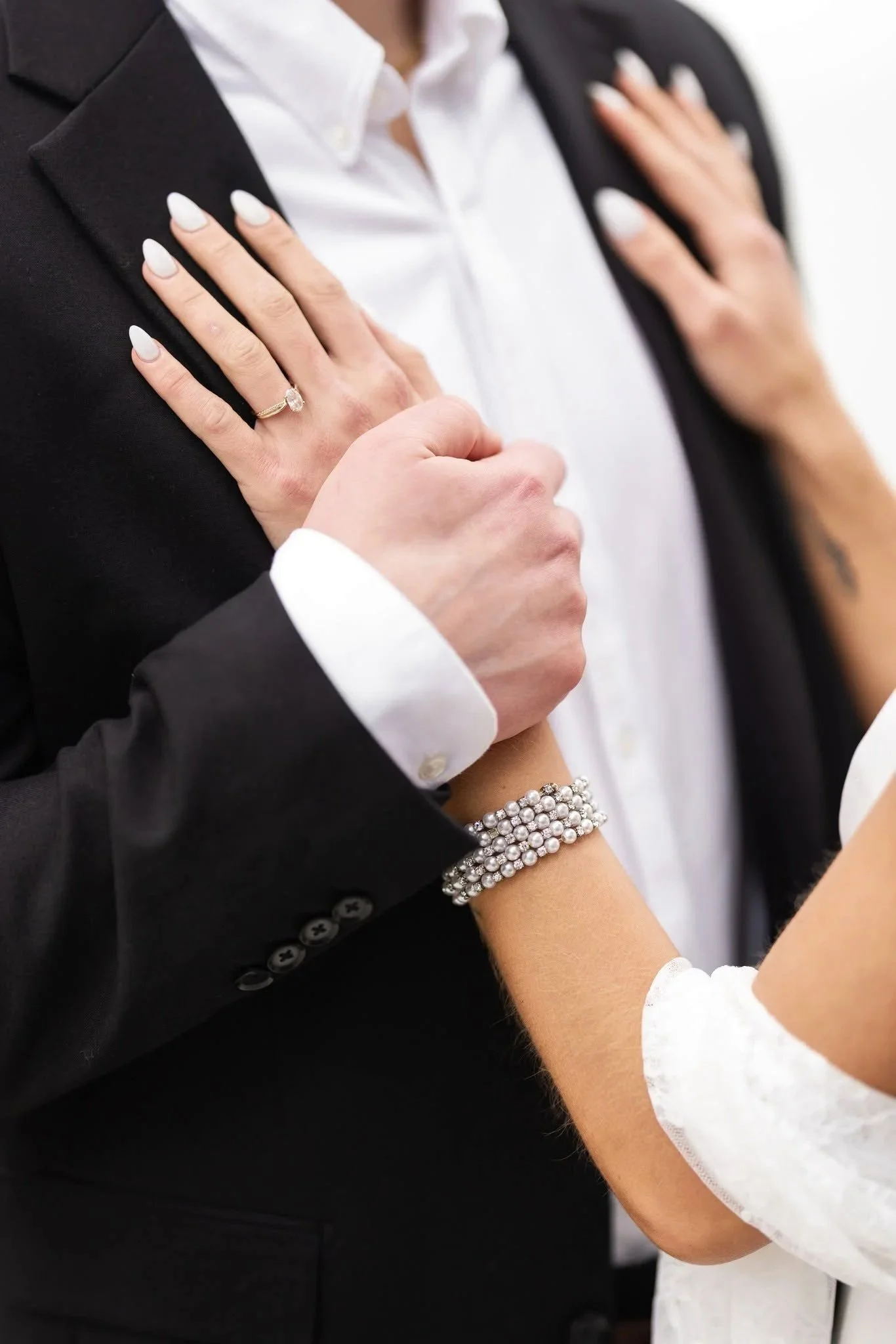 Bride and groom's hands
