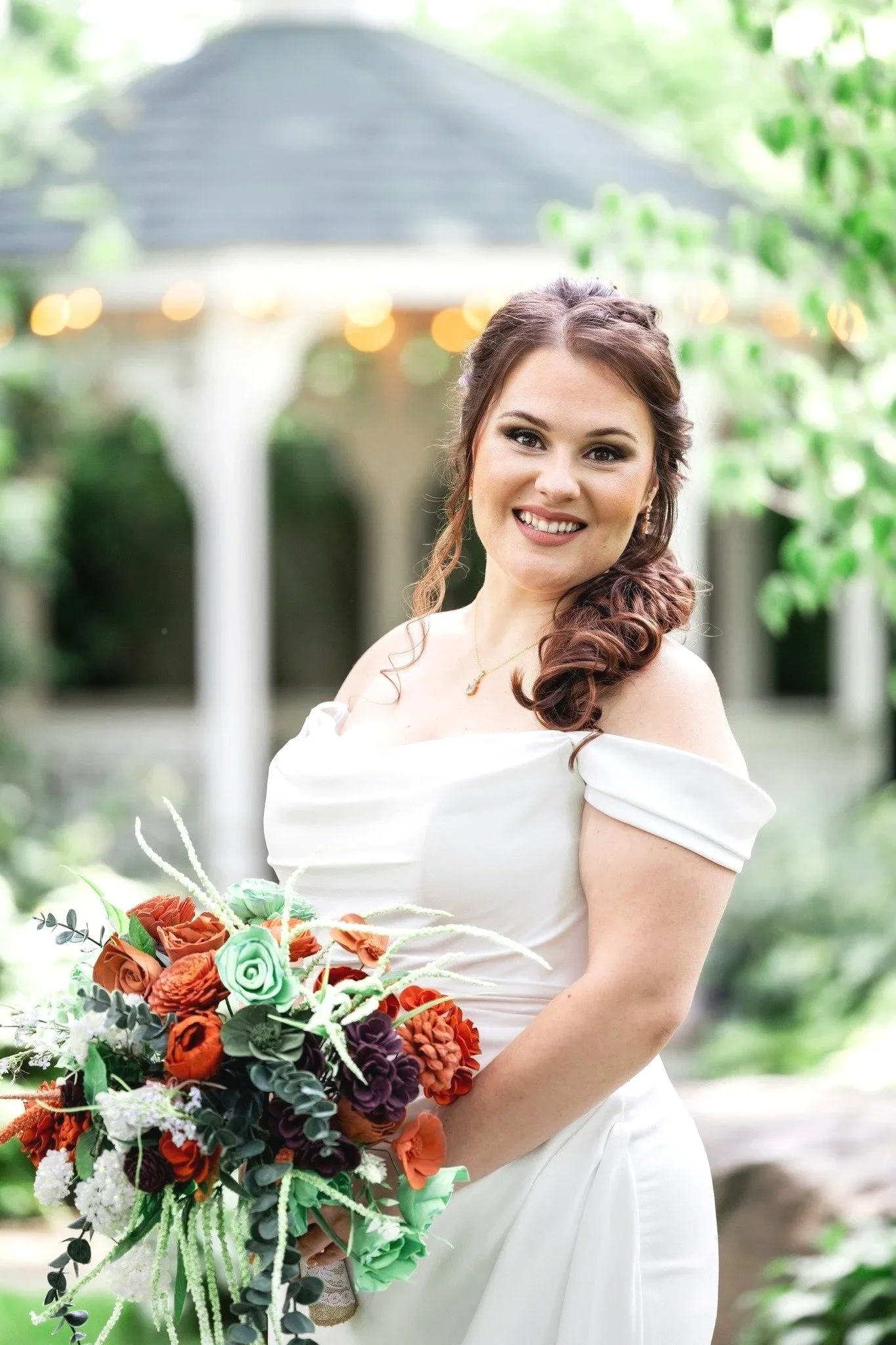 bride smiling photo with bouquet outside in owosso michigan