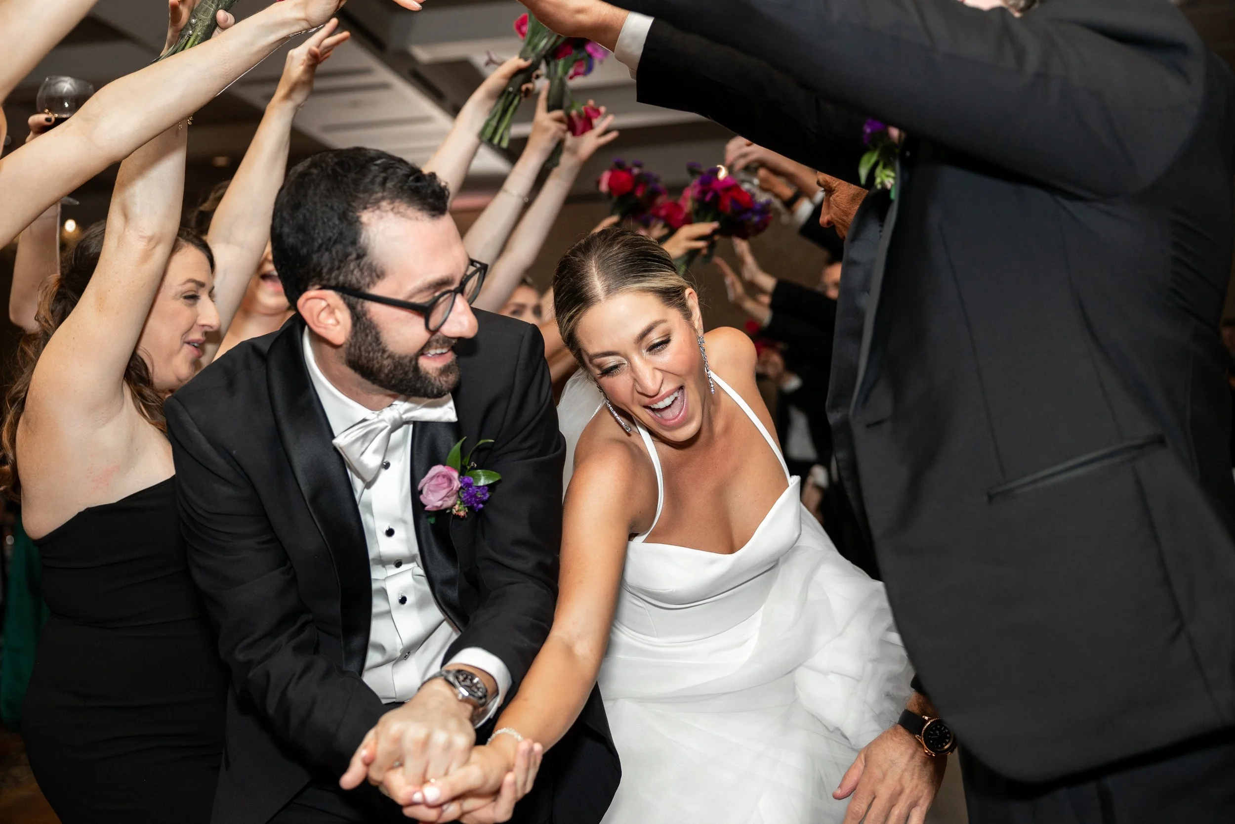 Bride and groom entering their reception party at Royal Park Hotel