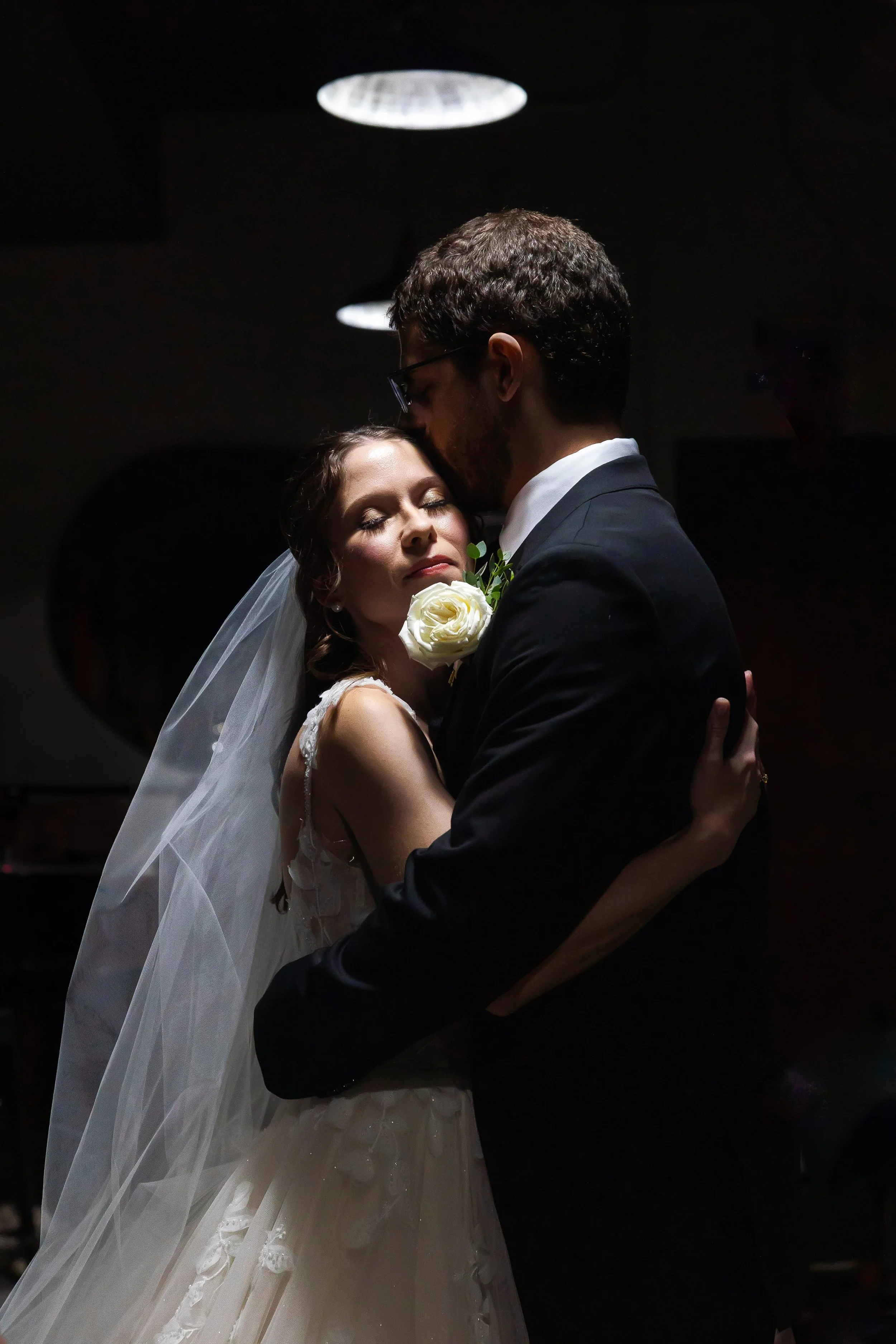 Bride and groom candid at The Holly Vault in Holly, Michigan