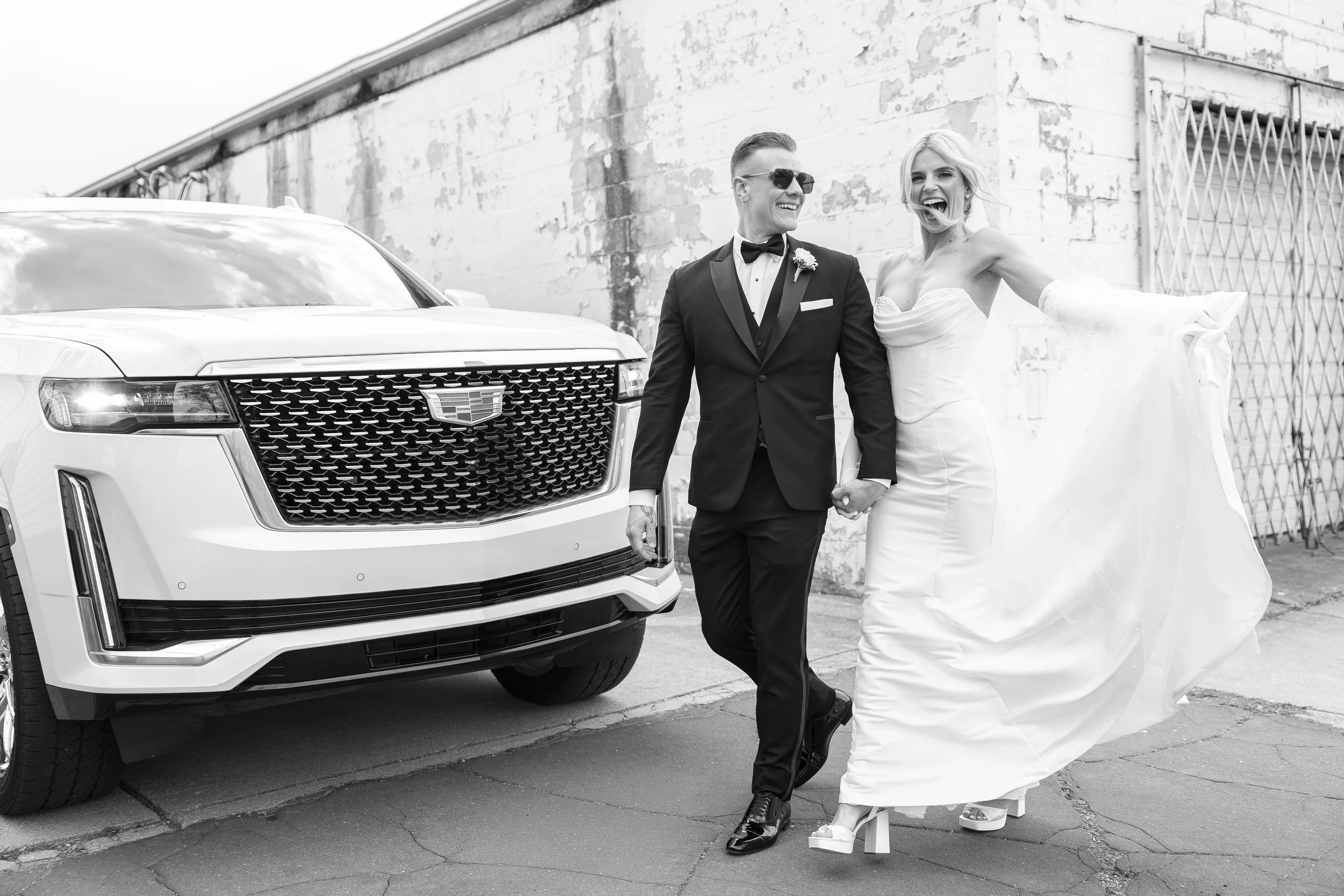 Bride and groom walking in downtown Detroit 