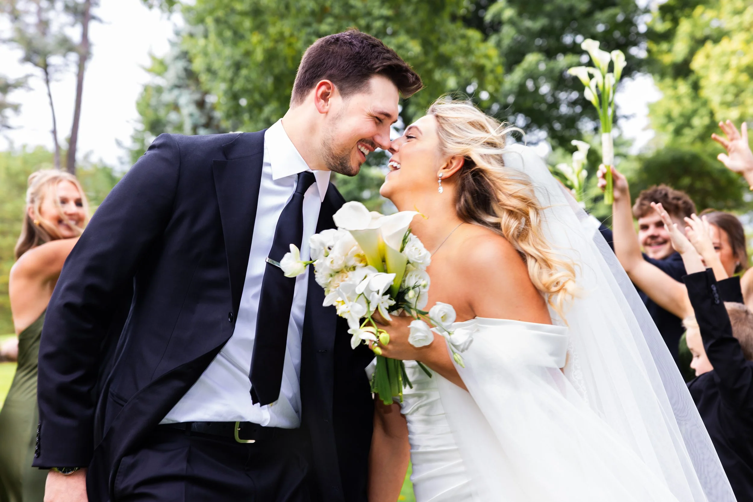 Bride and groom having fun at Pine Knob Mansion in Clarkston, Michigan