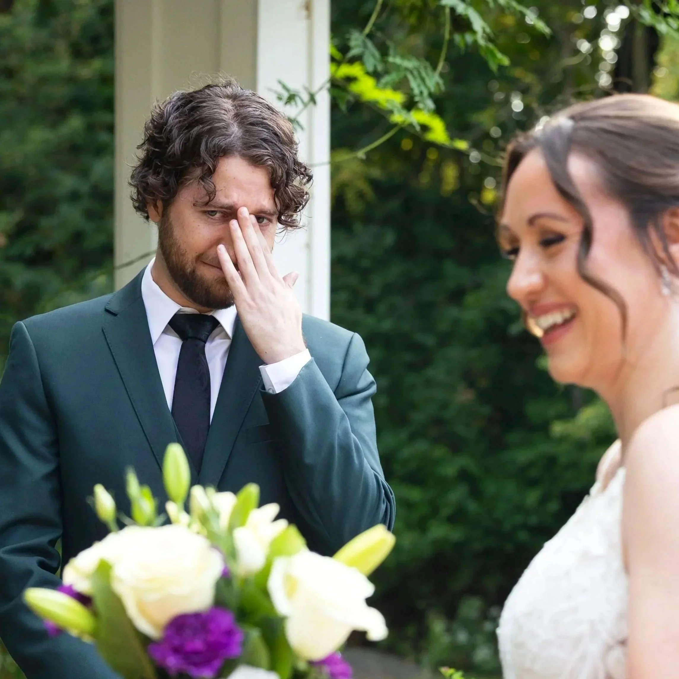 The groom tears up during the start of the wedding ceremony