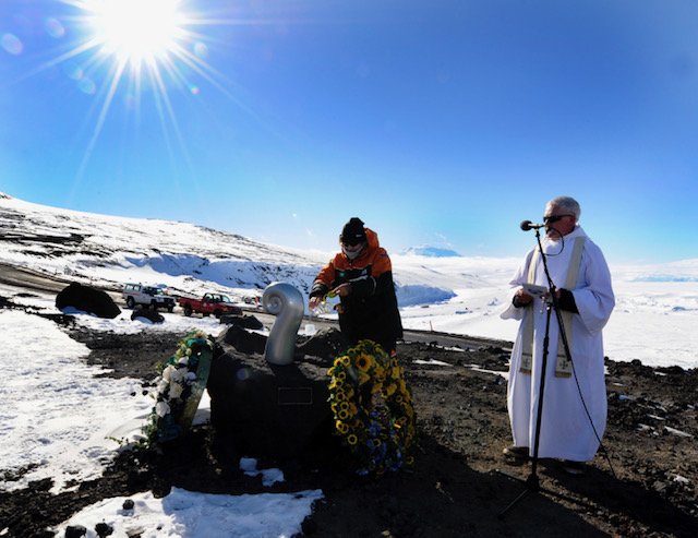 Margaret Brough at the Erebus Memorial, Antarctica, with Mt Erebus in the distance. A once-in-a-lifetime visit to the memorial to all who died at Mt Erebus.