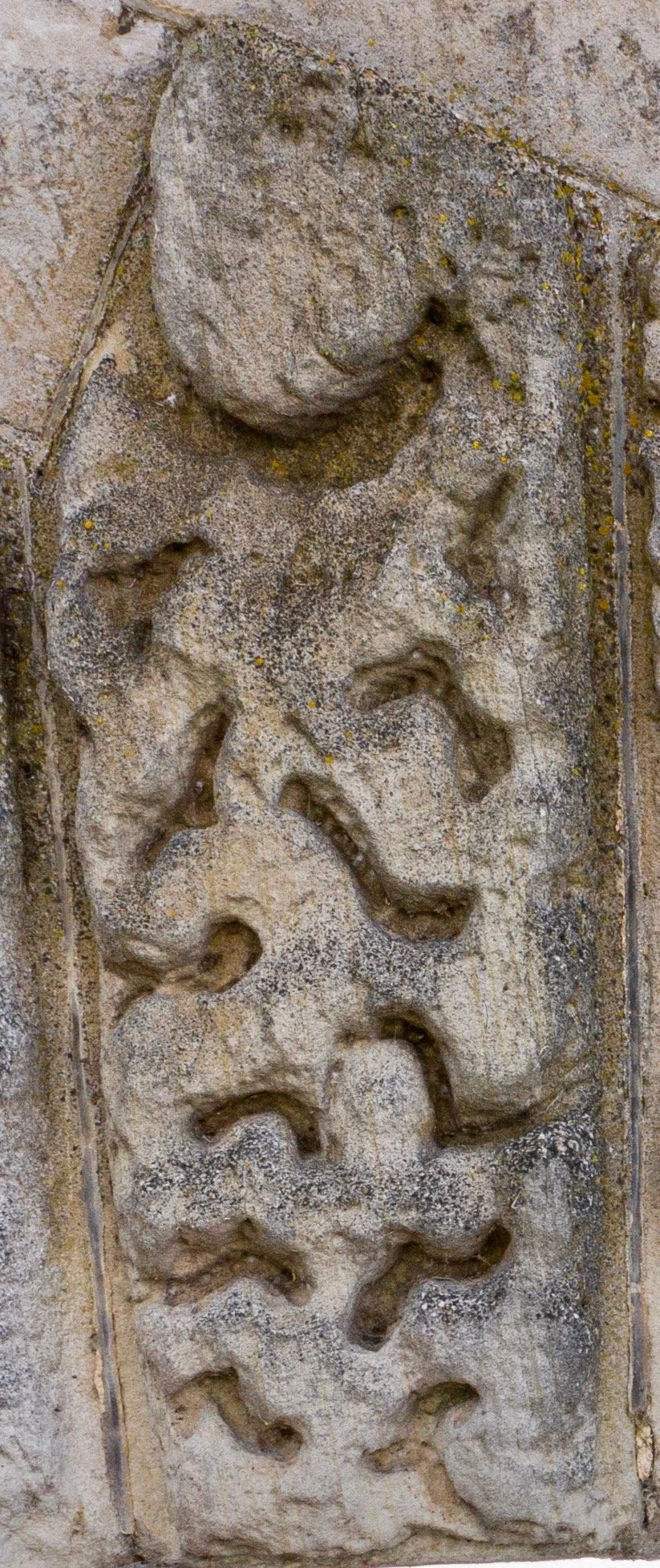 South face, west arch 9th voussoir, L