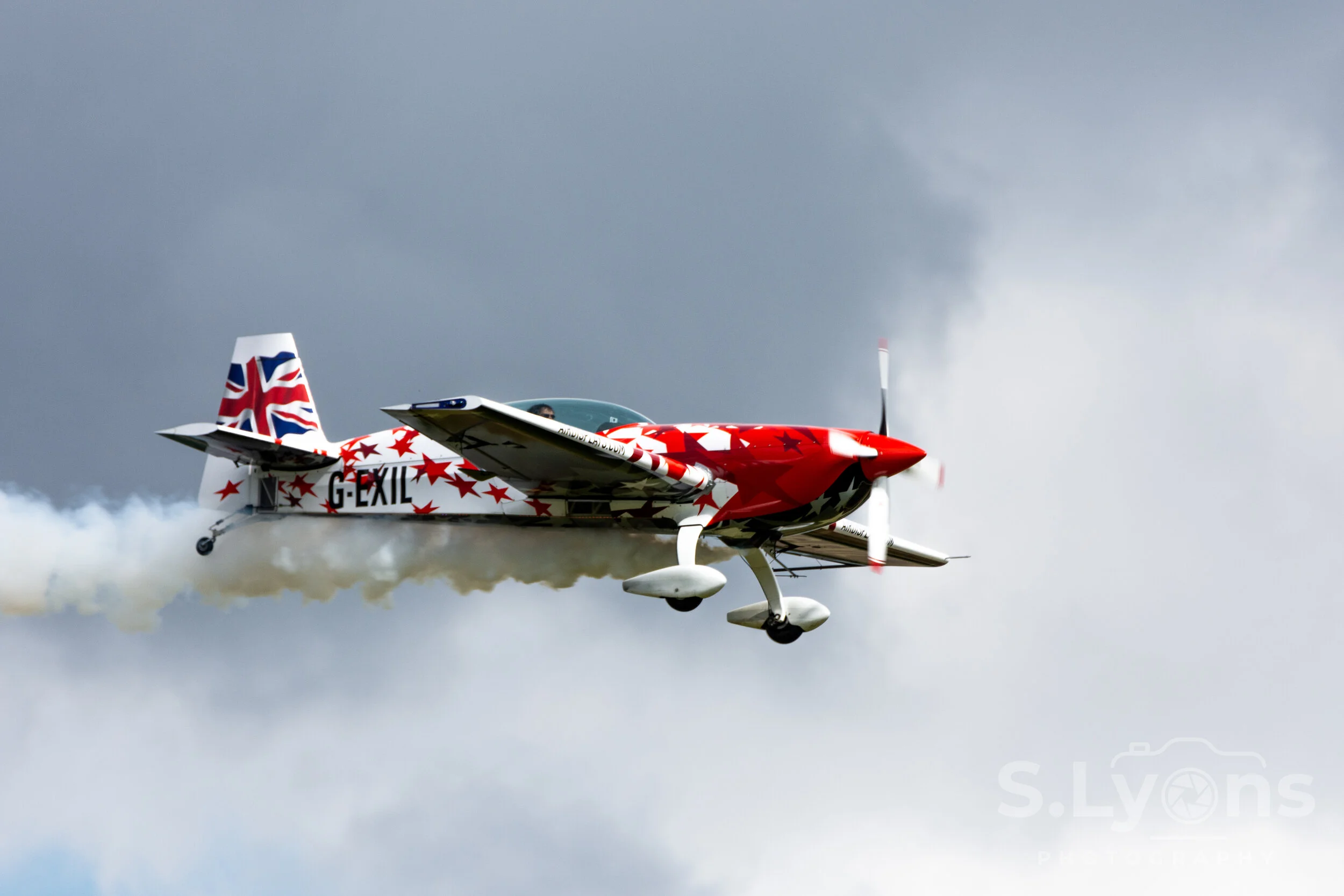 A single Extra EA-300 up close as part of the Blades aerobatic display