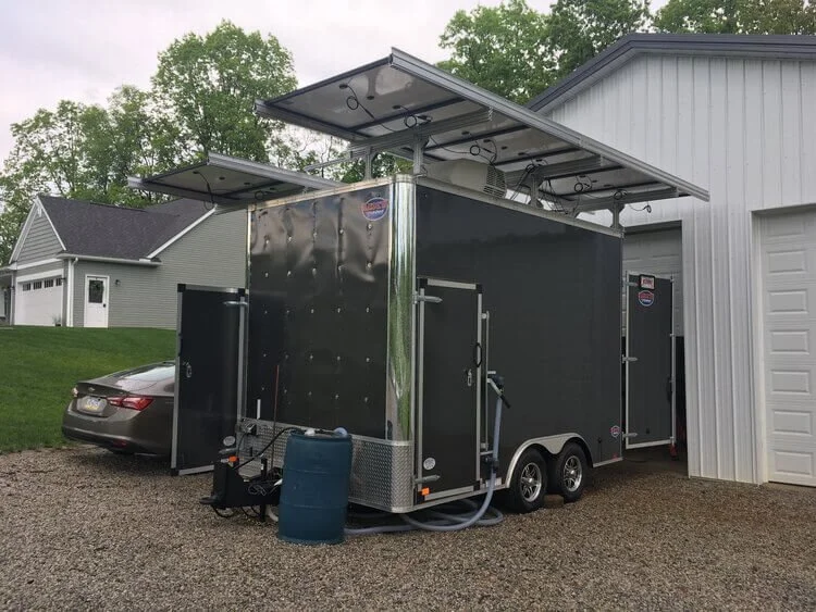 A mobile system installed in a heavy-duty trailer