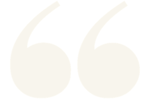 White quotation marks on a black background.