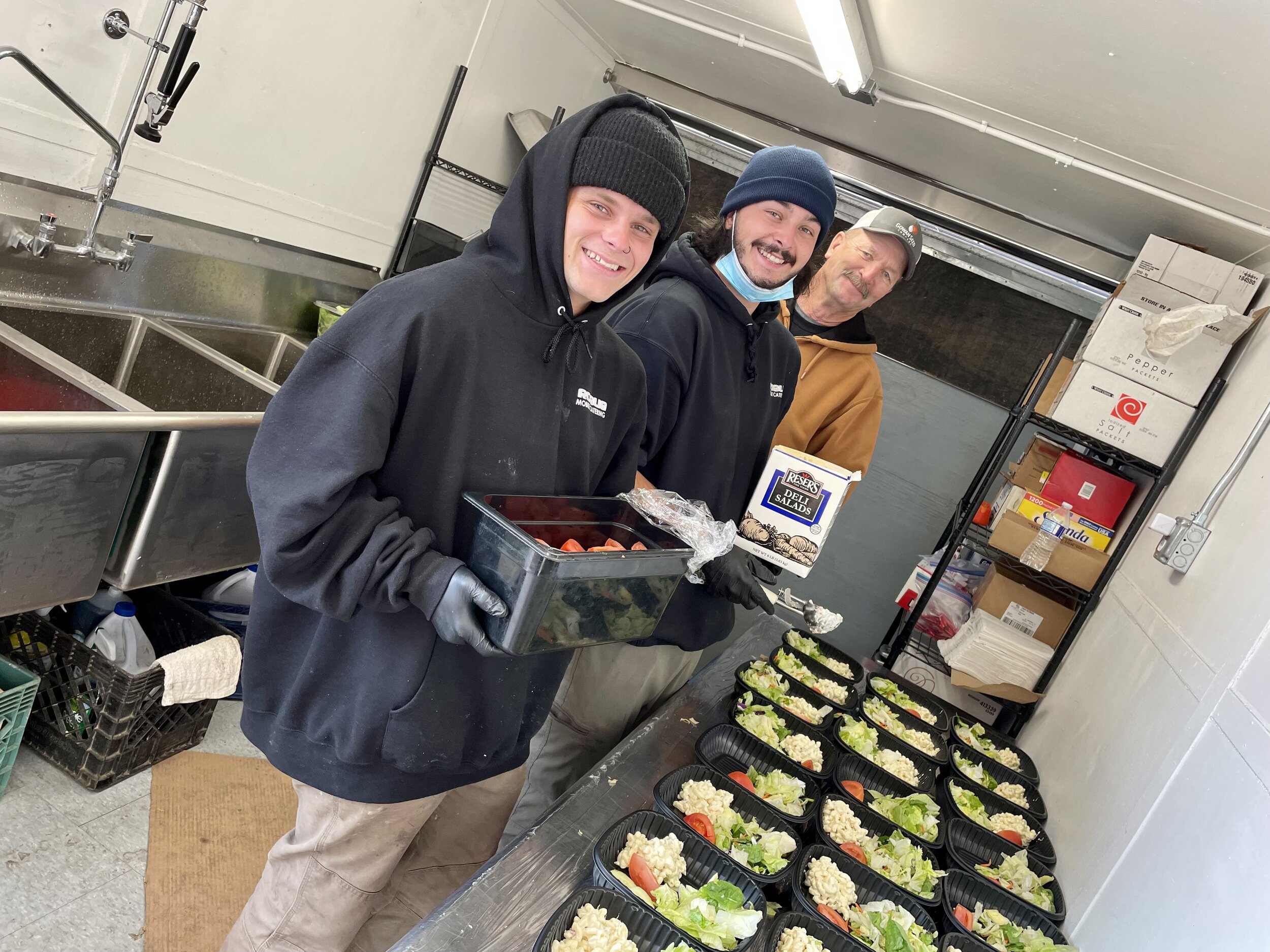 Ruby, Brandon and Wayne whipping up salad for dinner service!