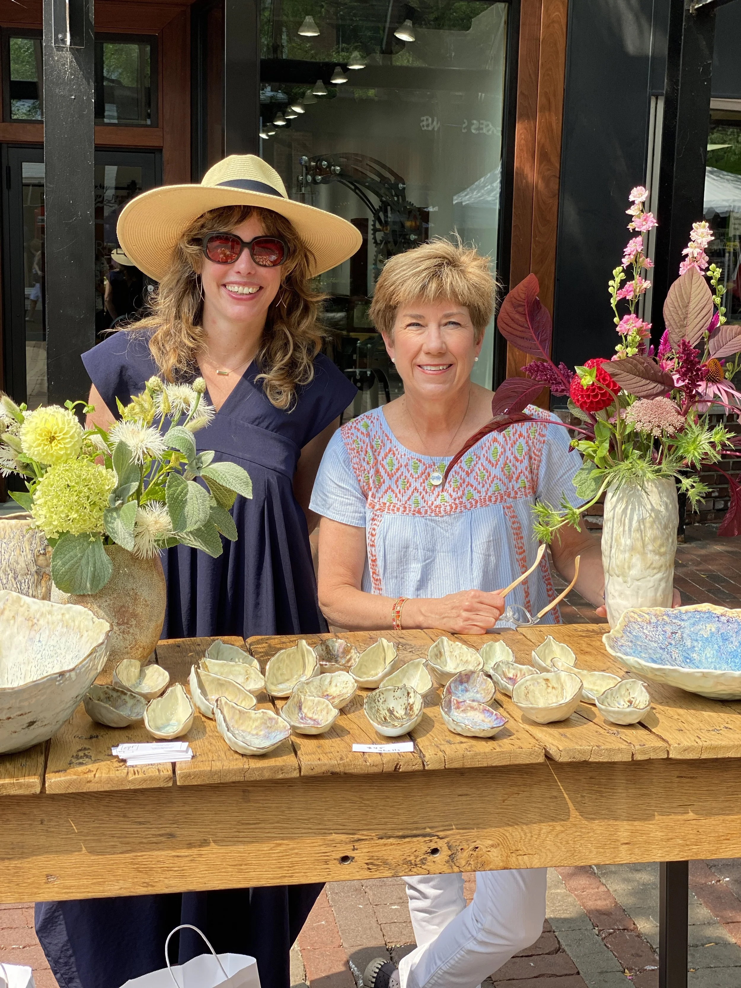 In Burlington outside of Raintree Jewelry with Jana and her beautiful flowers from Home & Garden Vermont 