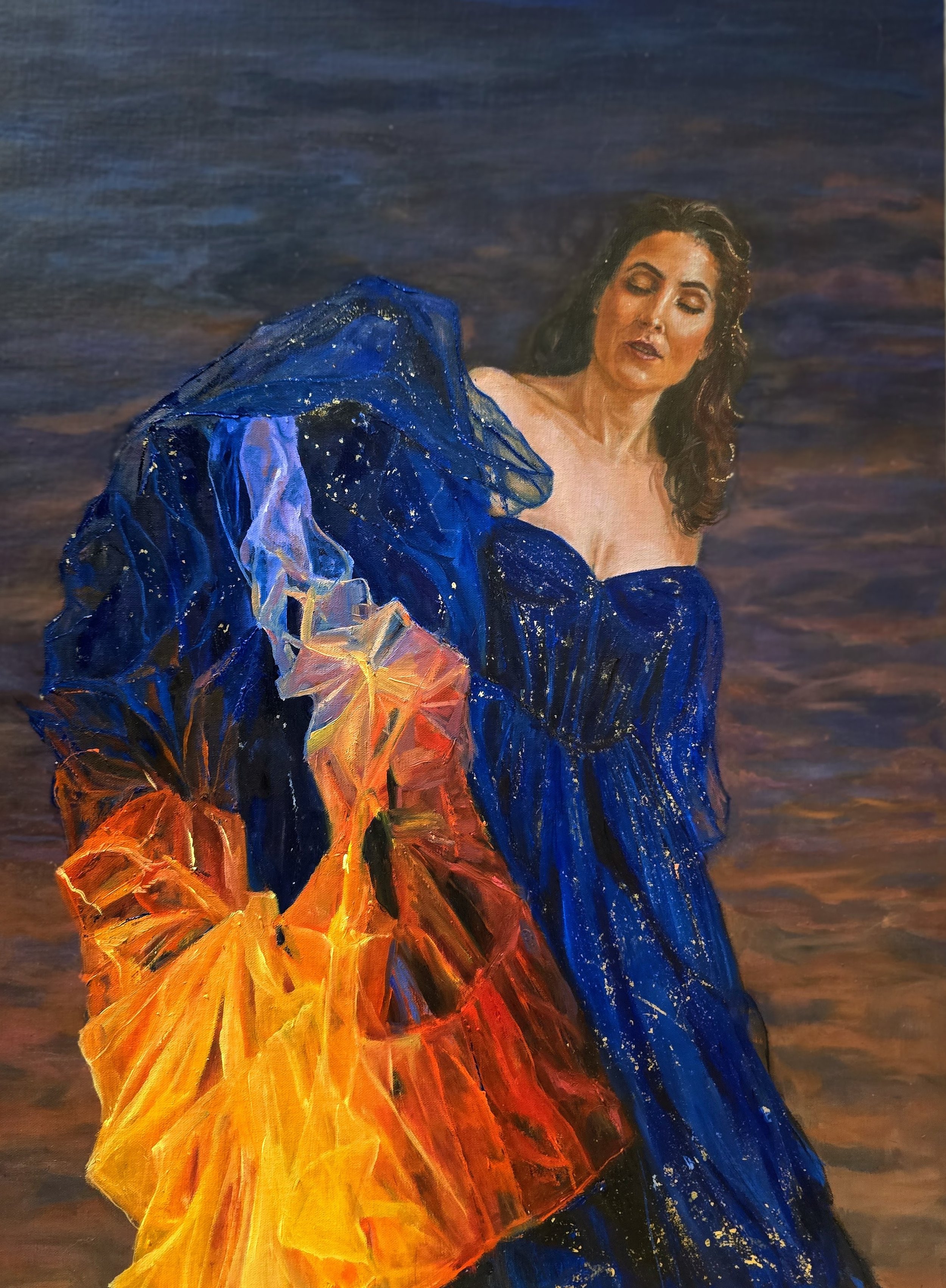 A painting of a woman with dark brown hair, wearing a blue off-shoulder dress with gold stars, holding a large orange and yellow leaf, with a dark sky background.