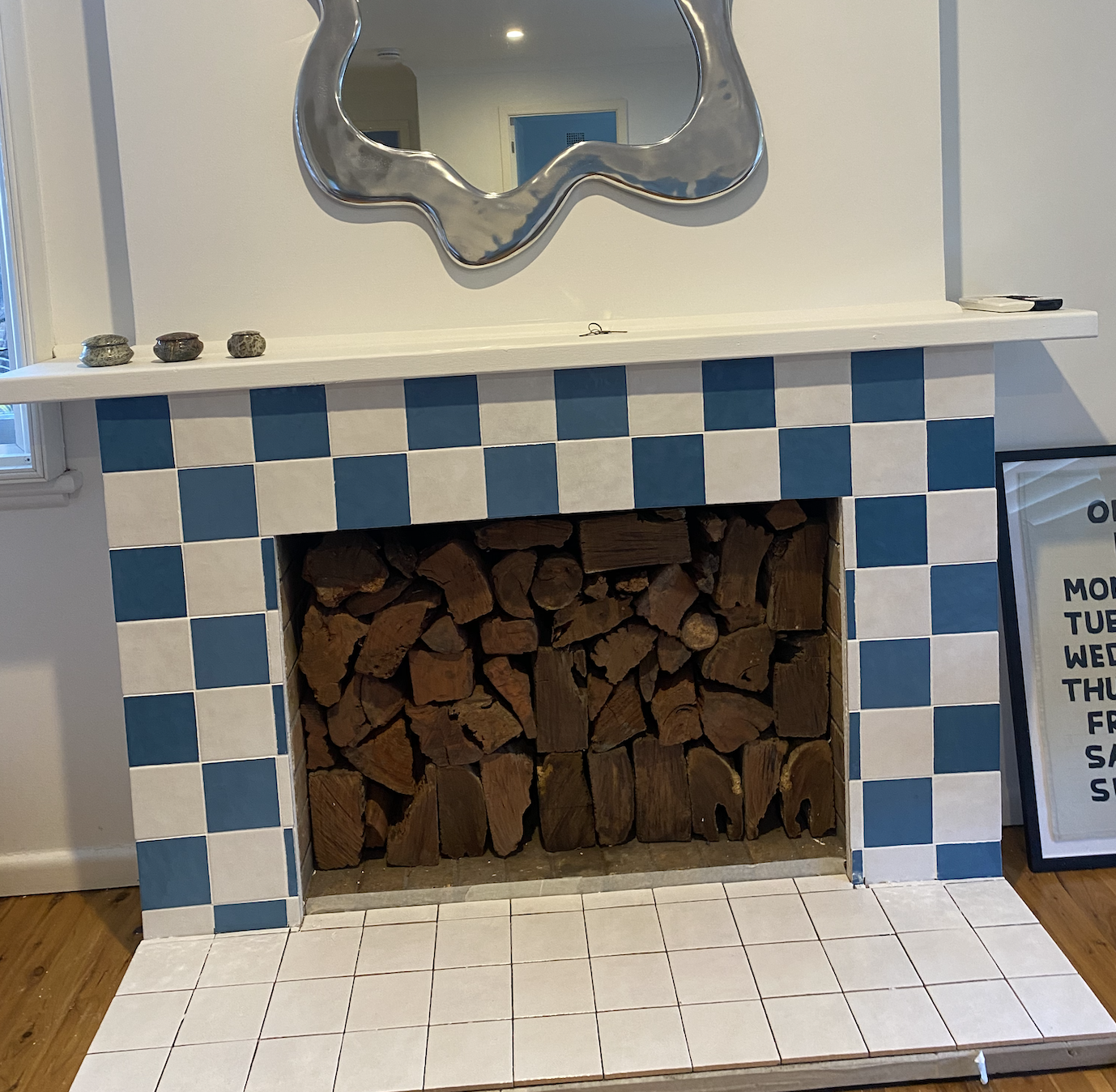  $300 in tiles and materials and we have totally transformed this fireplace. 