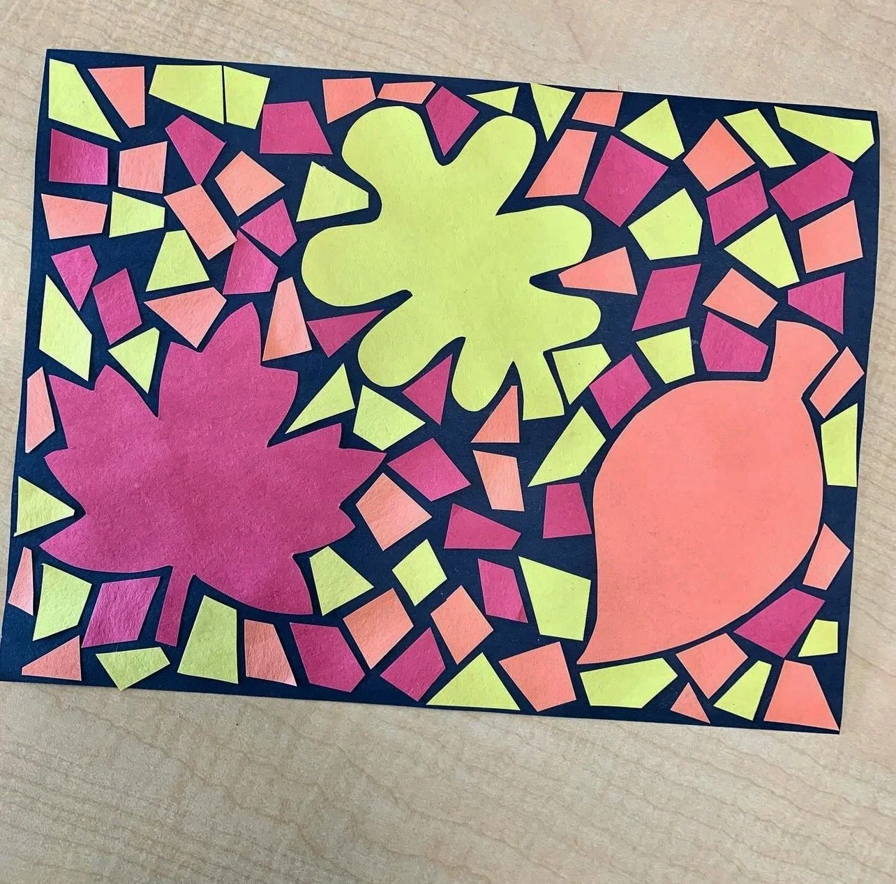 A fall mosaic. 🍁 🍂 

Be careful, put the glue on the &ldquo;tiles&rdquo;, then stick them to the black. Don&rsquo;t put the glue stick on the black as it tends to dye the paper and mess up your hard work. 

#Frenchteachers #frenchimmersion #grade3 