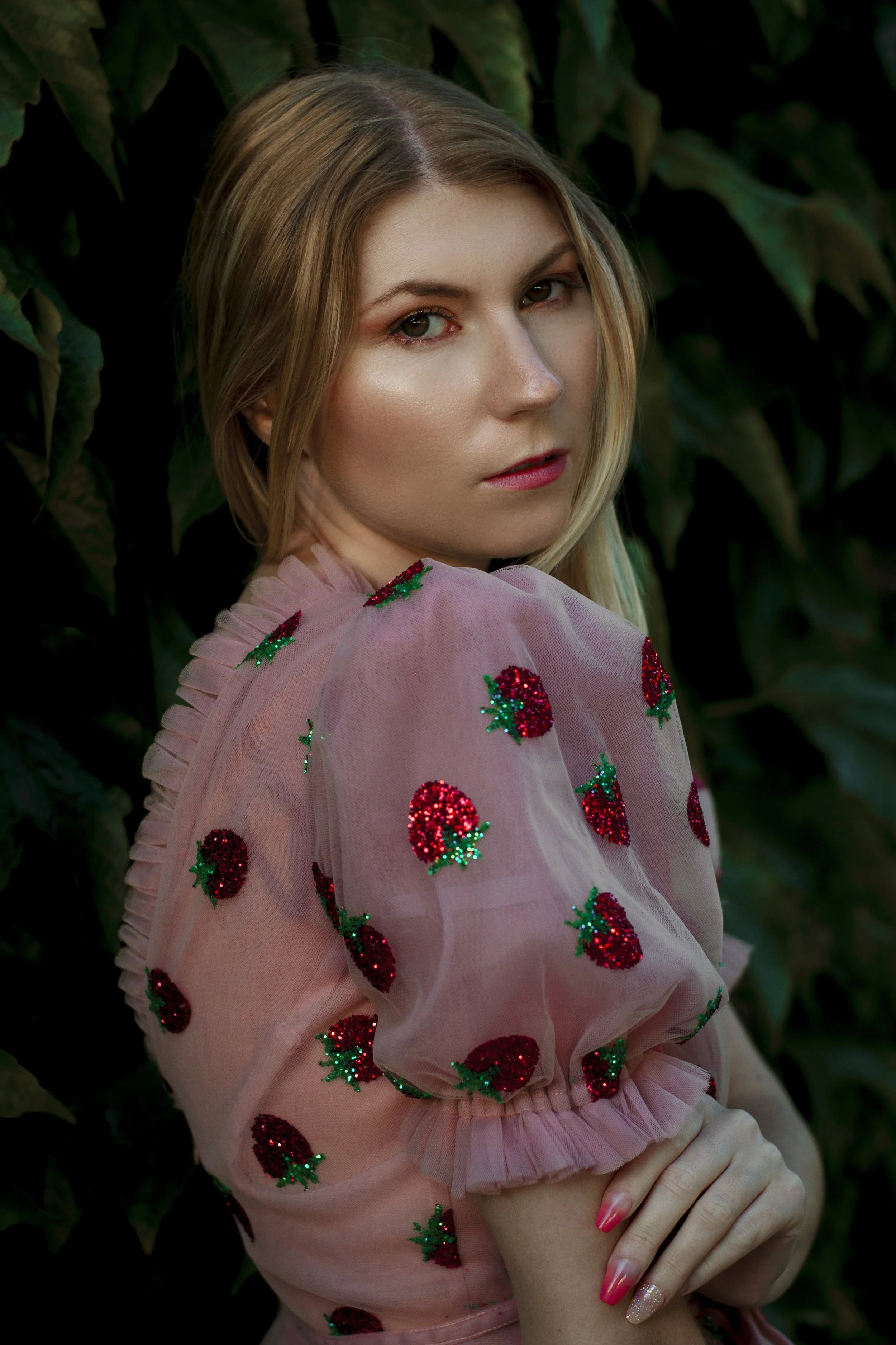 Woman in a gown against a green background (1).jpg