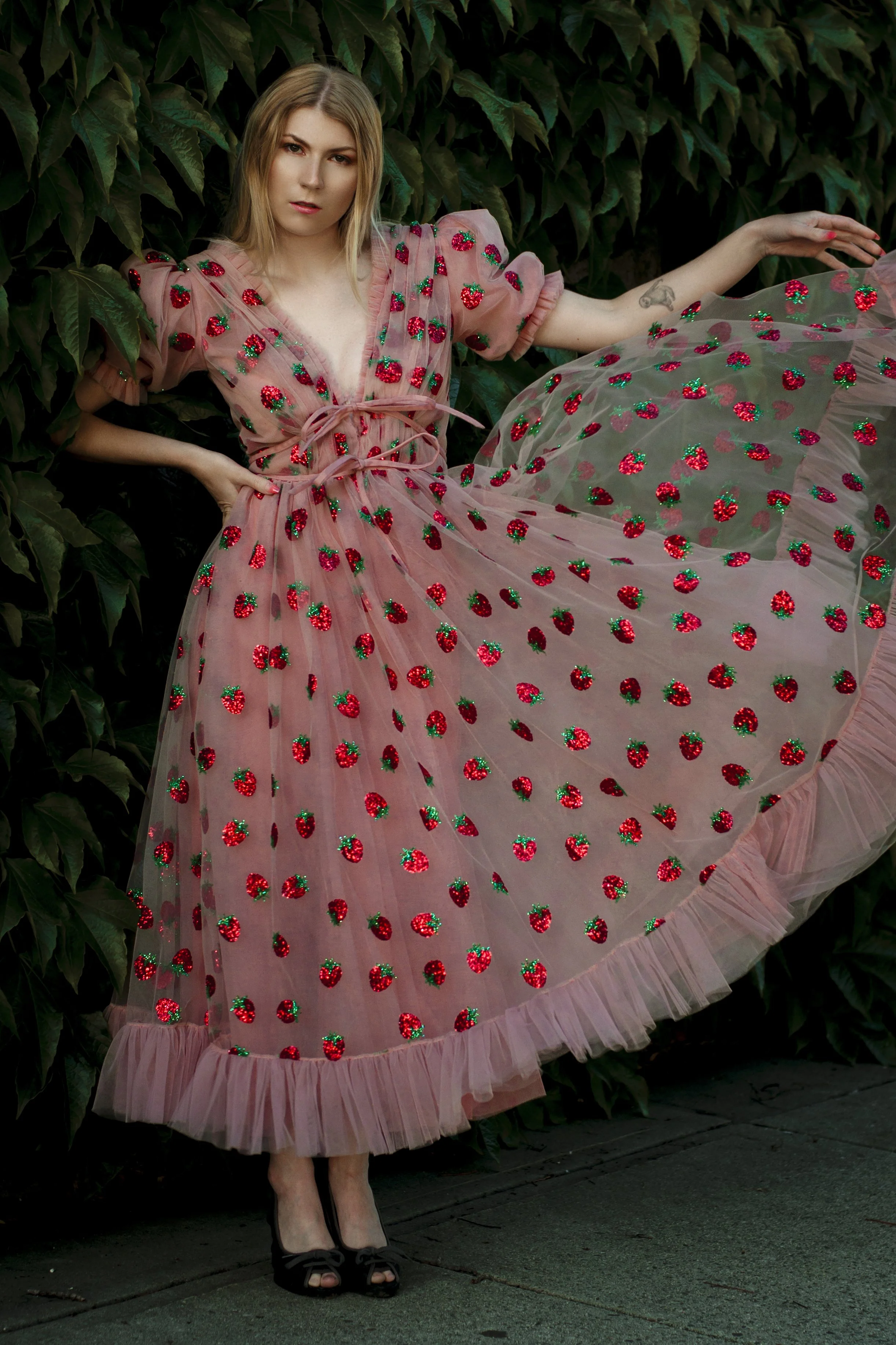 Woman in a gown against a green background (2).jpg