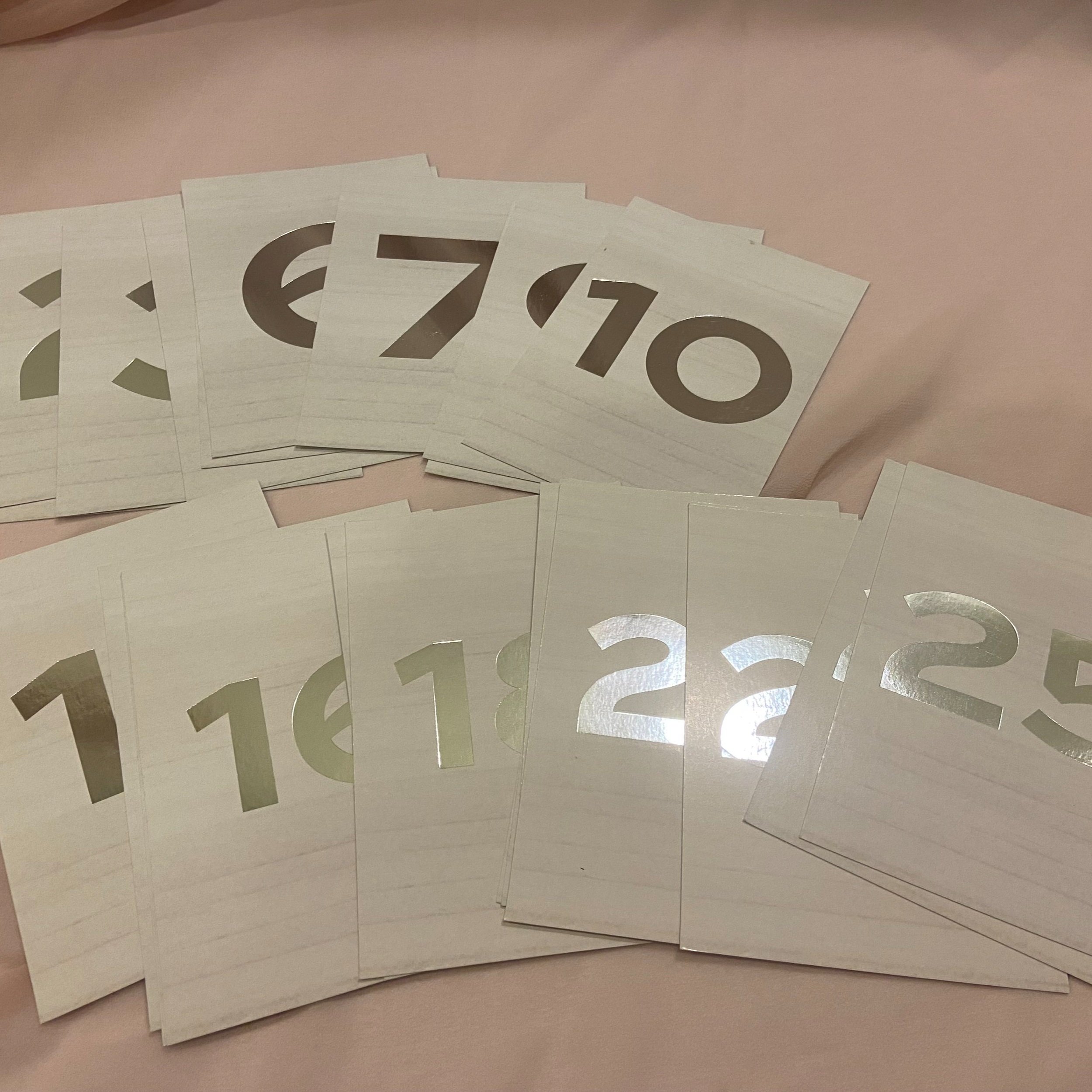 White and silver table numbers 1-25