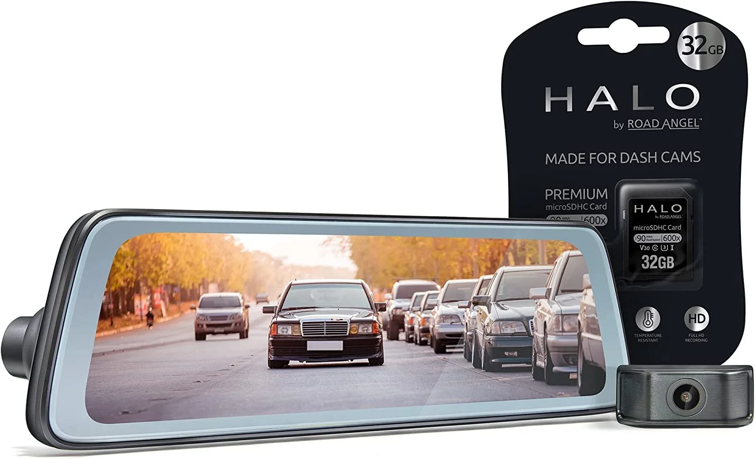 A dash cam device and its packaging, showing a clear image of a city street with cars parked along the sides and a few driving on the road, with trees with autumn foliage in the background.