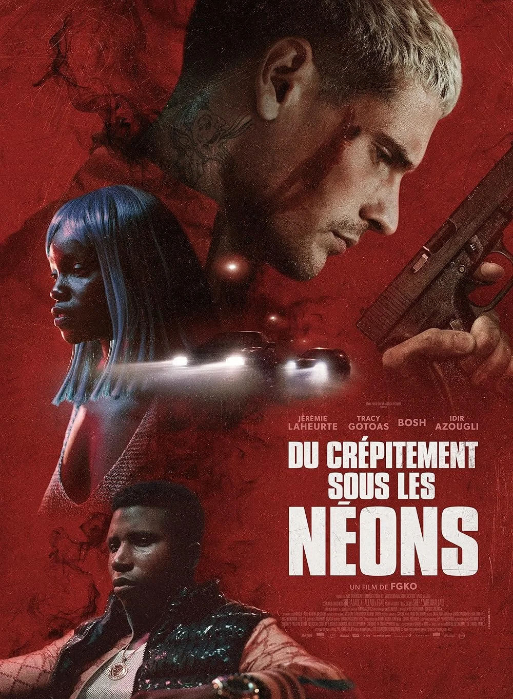 Movie poster for "Du Crépitement Sous Les Néons" featuring three characters: a man with short blond hair and a gun, a woman with long blue hair, and another man with a serious expression, set against a red background with multiple cars.