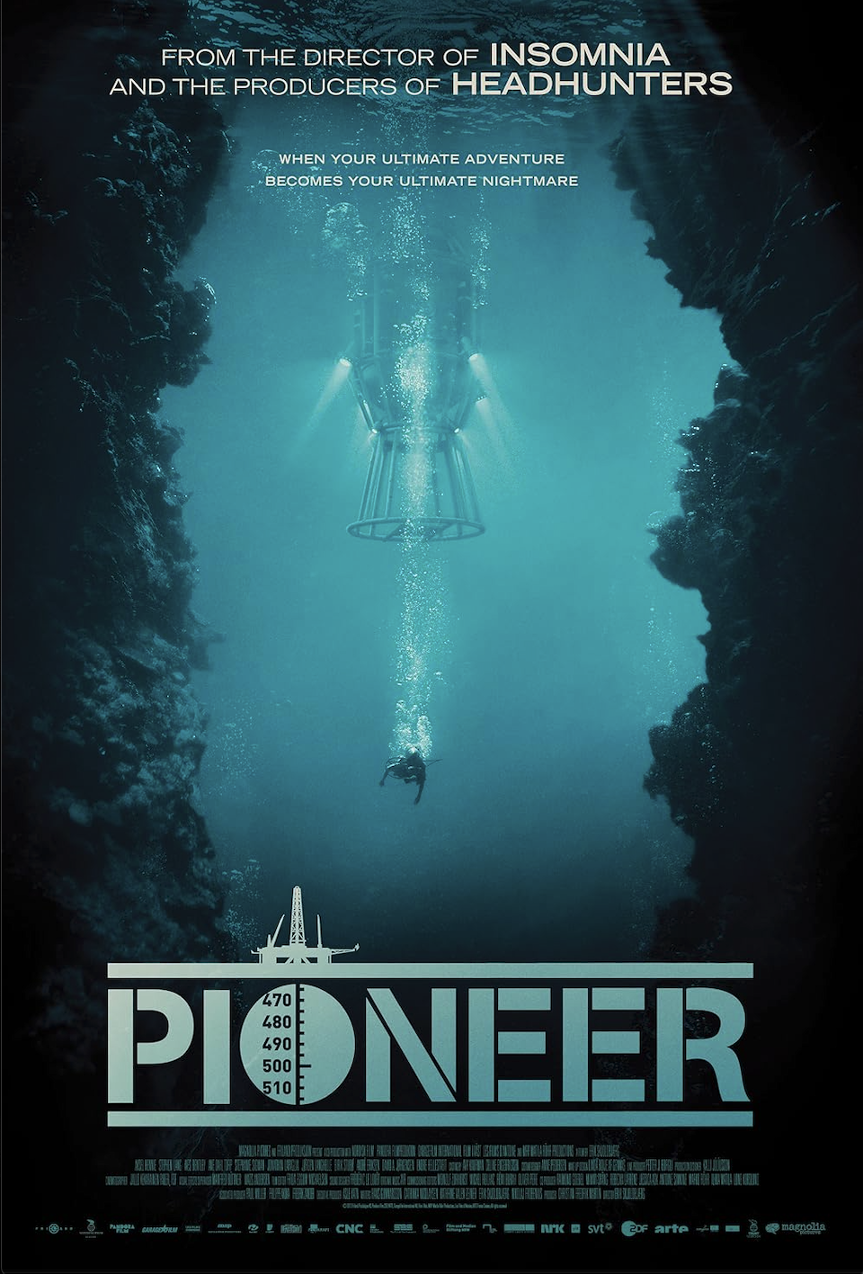 Movie poster for 'Pioneer' shows an underwater scene with a diver descending between two rocky cliffs. A deep-sea exploration submersible is also beneath the diver, illuminated by underwater lights, with bubbles rising to the surface.