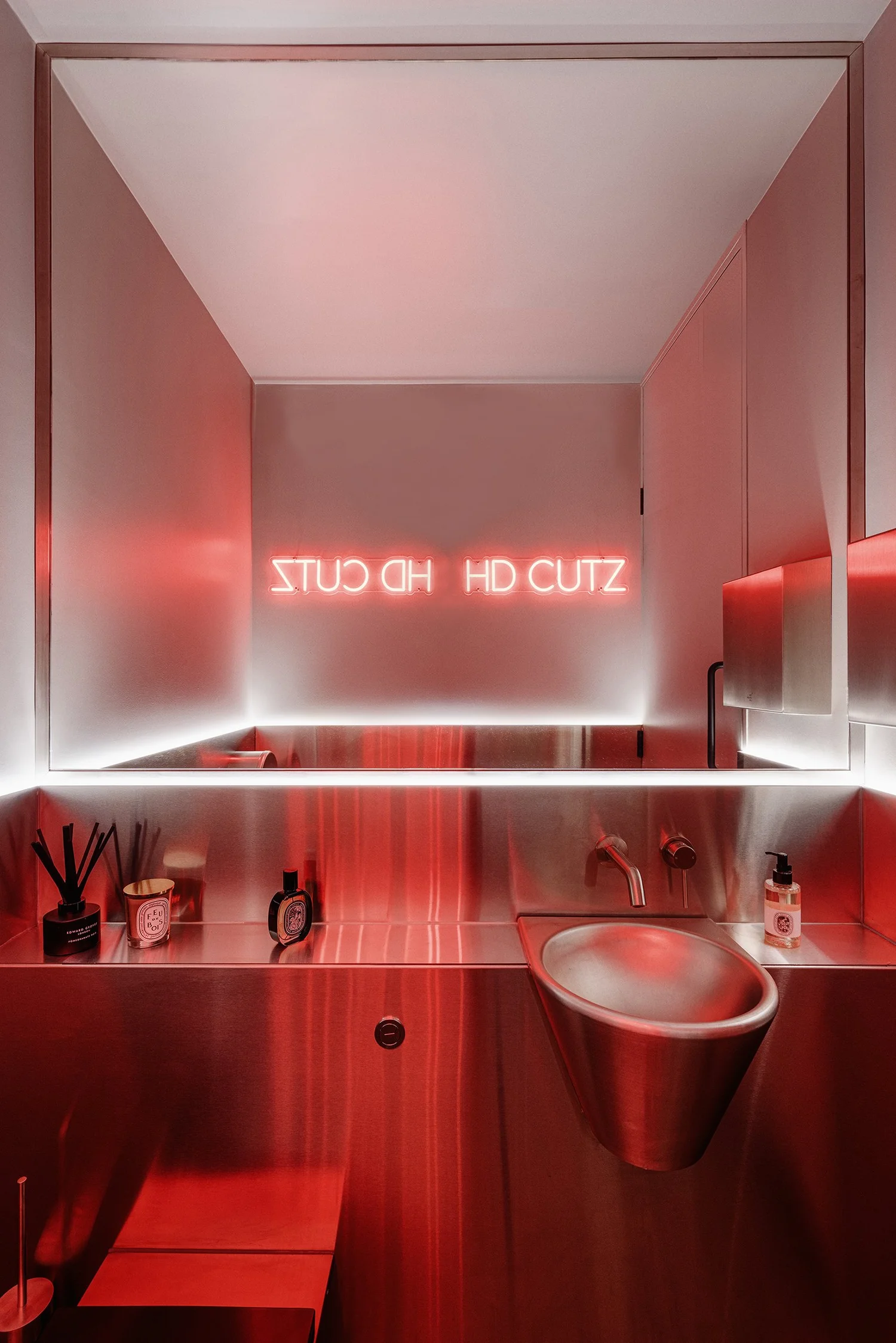 Neon-lit room at HD Cutz