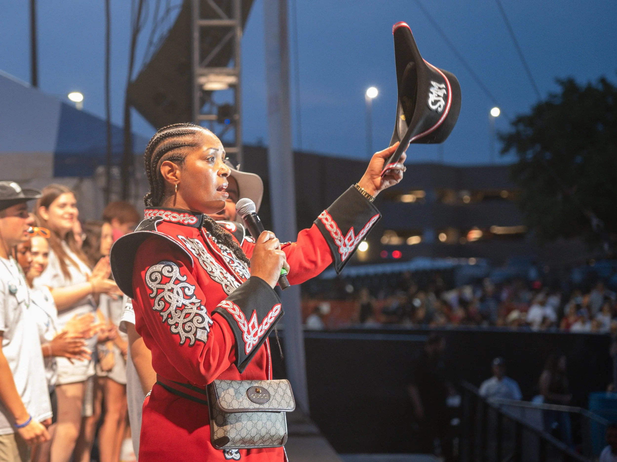 Admiral Kaye Monk-Morgan waves to the Riverfest crowd