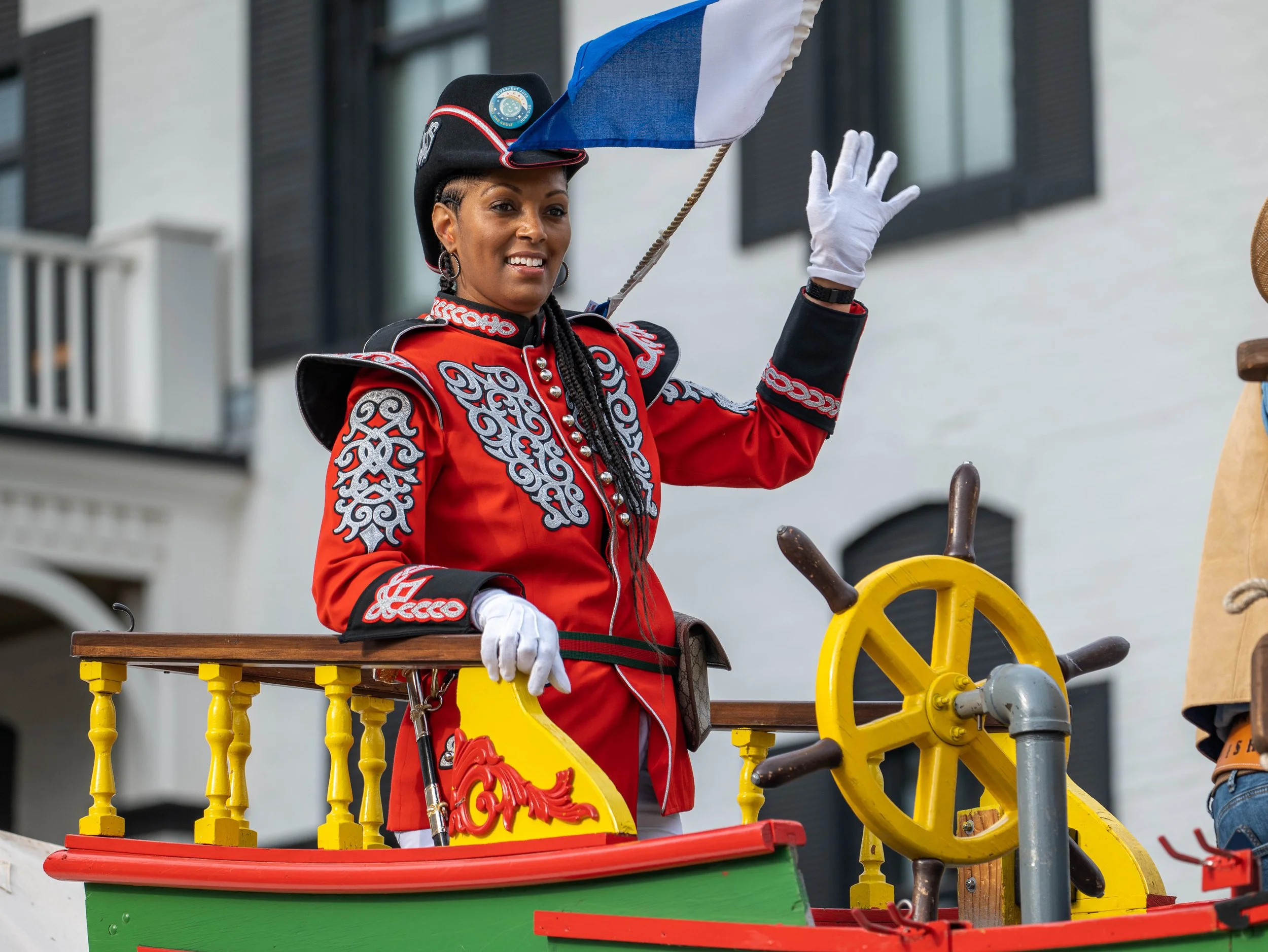 The Admiral waves at the opening parade
