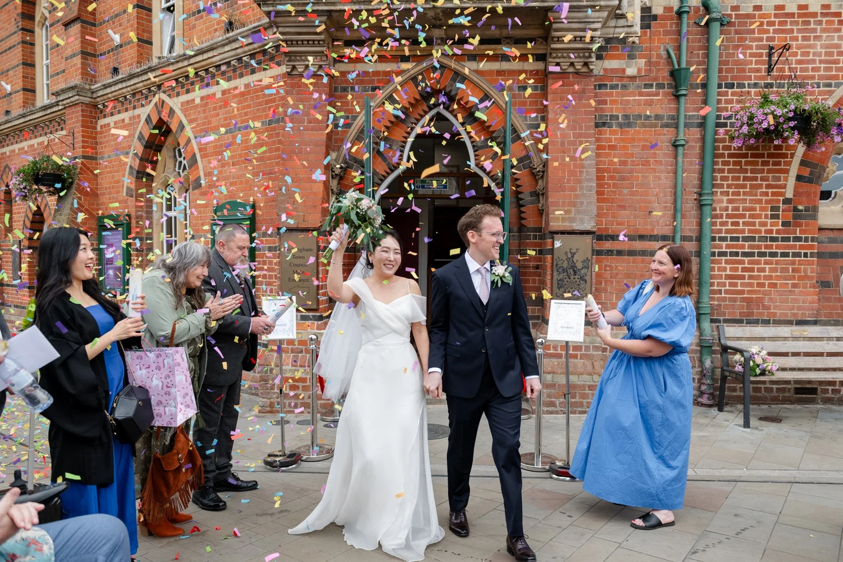 Newly married couple outside Wokingham Town Hall