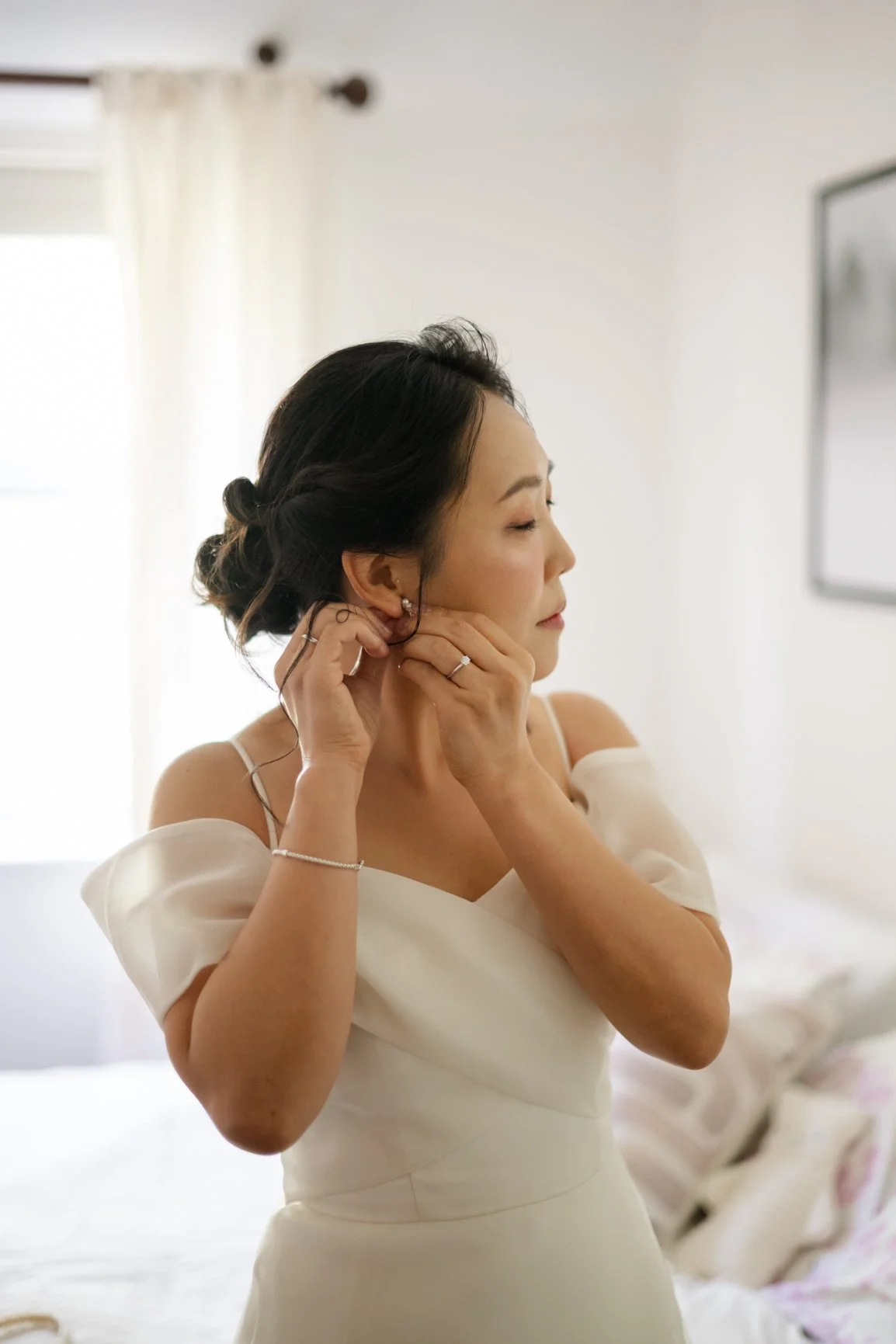 Bride getting ready for an intimate wedding in Wokingham