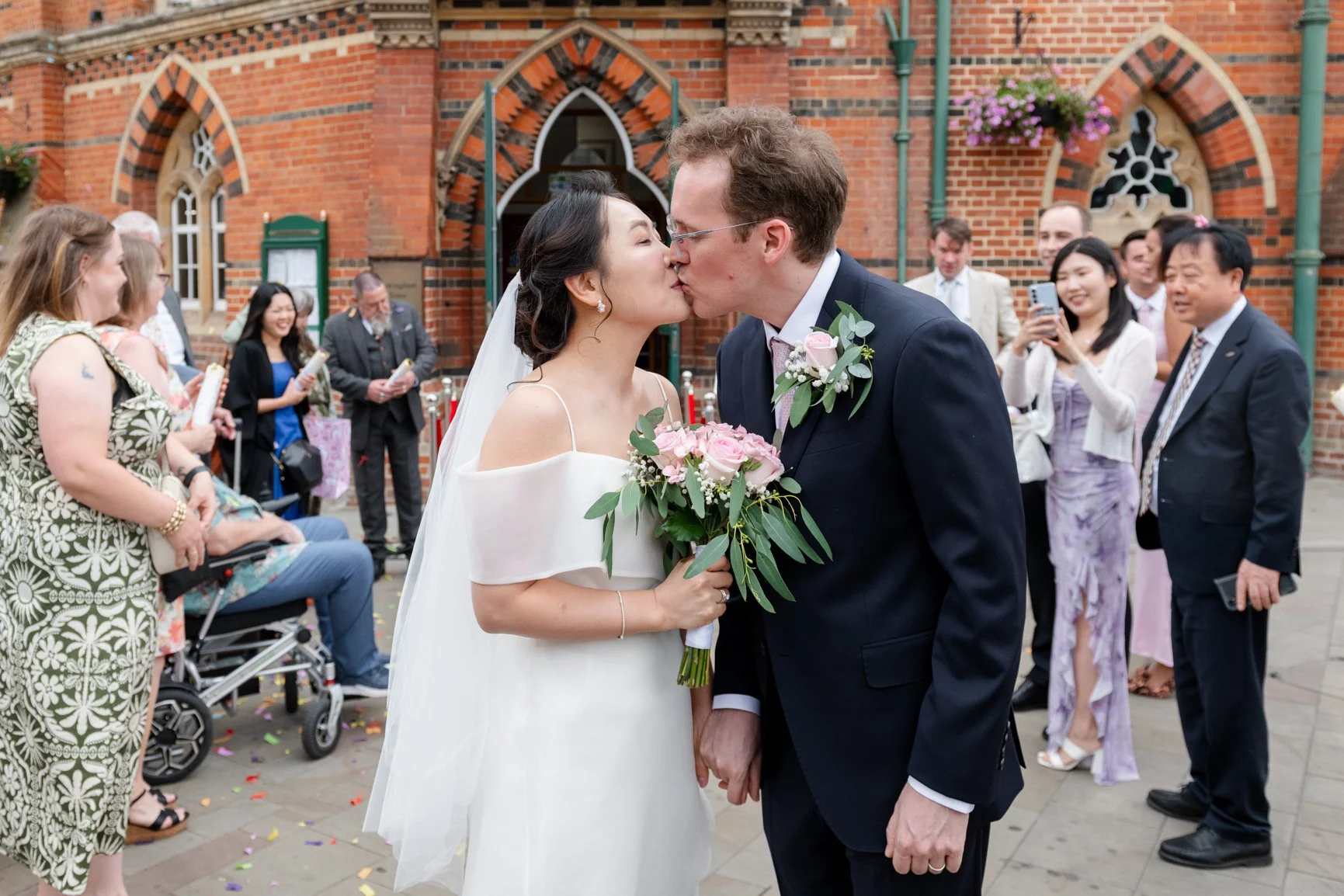 Newly married couple outside Wokingham Town Hall