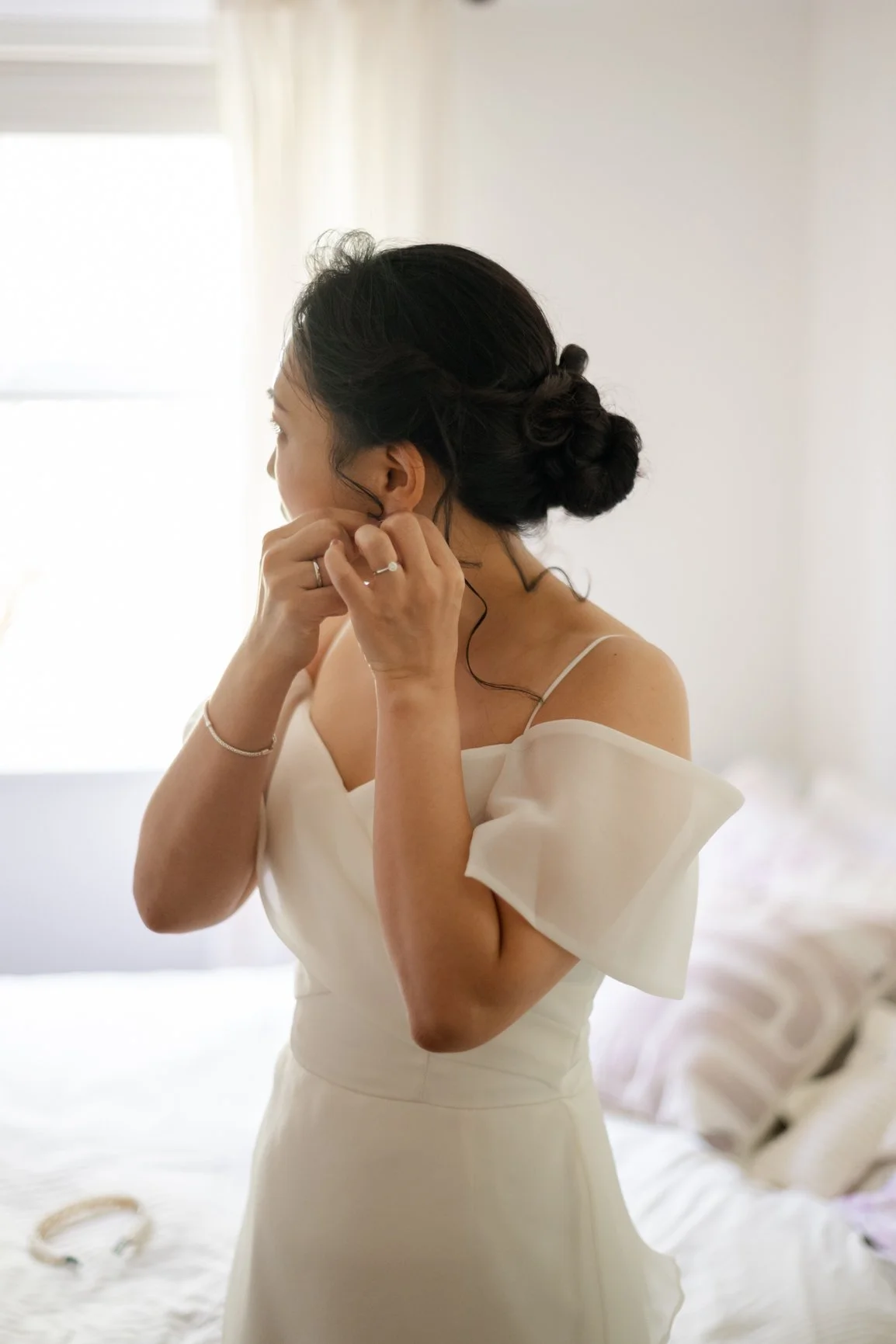 Bride getting ready for an intimate wedding in Wokingham