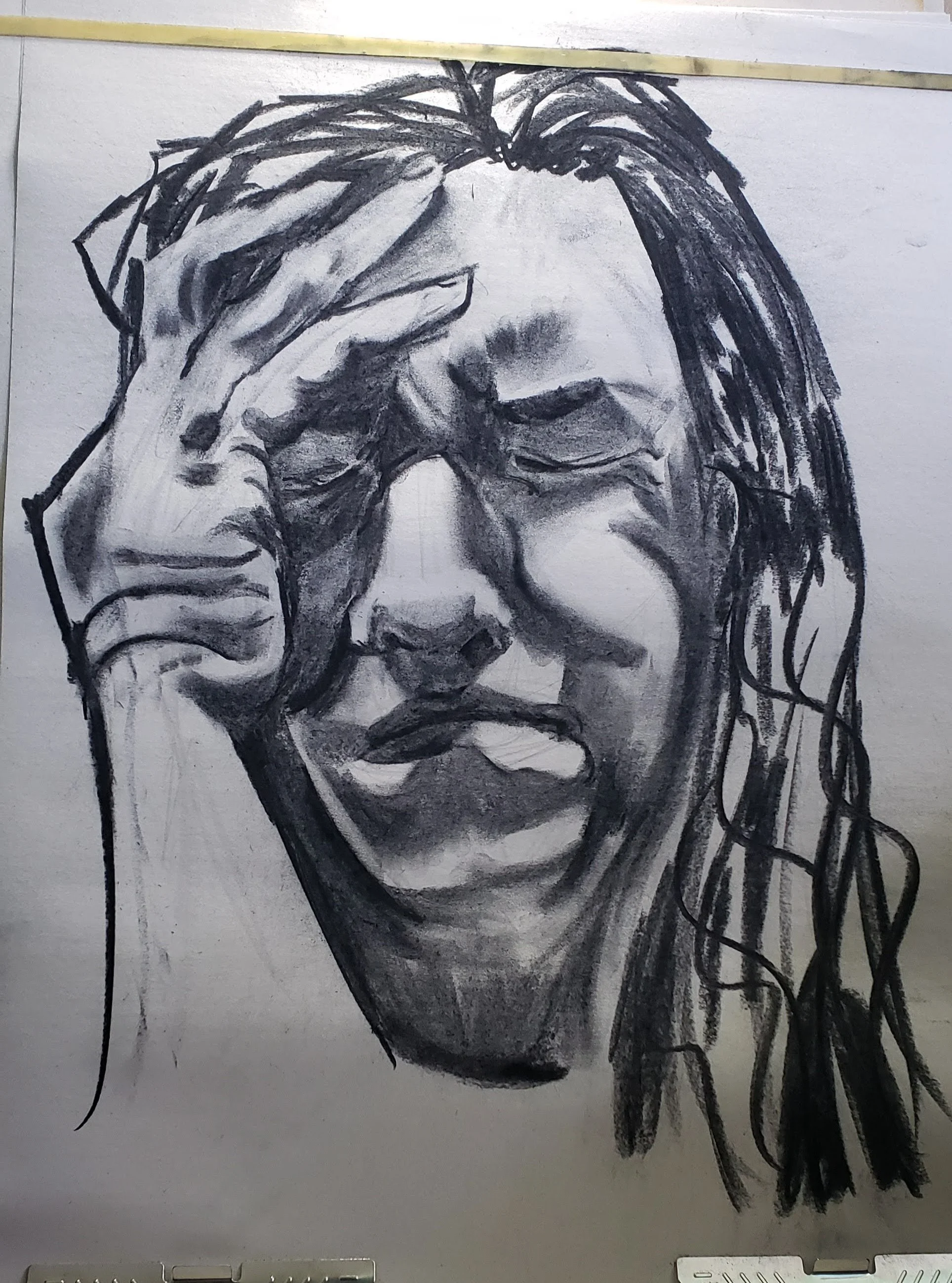 charcoal drawing of grief