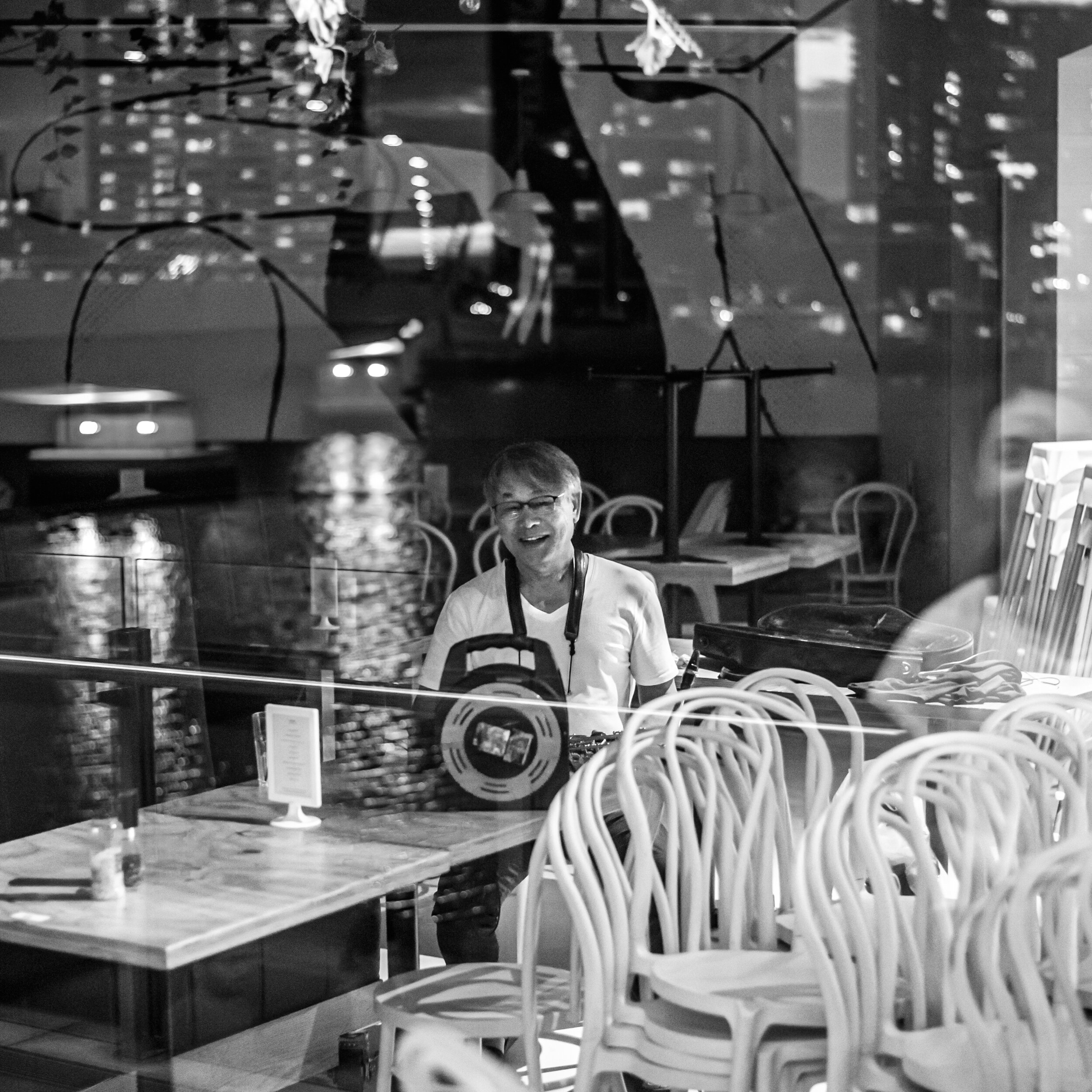 FACES-SHUJA'ATH AHMADI_MUSICIAN IN AN EMPTY CAFE.jpg