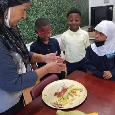 3rd Grade - Today was gardening class day! We ate squash made like pizza!! A little olive oil, seasonings, halal pepperoni and cheese. It was delicious!! The eggplant pizza was awesome! All from our garden, Alhumdulliah!