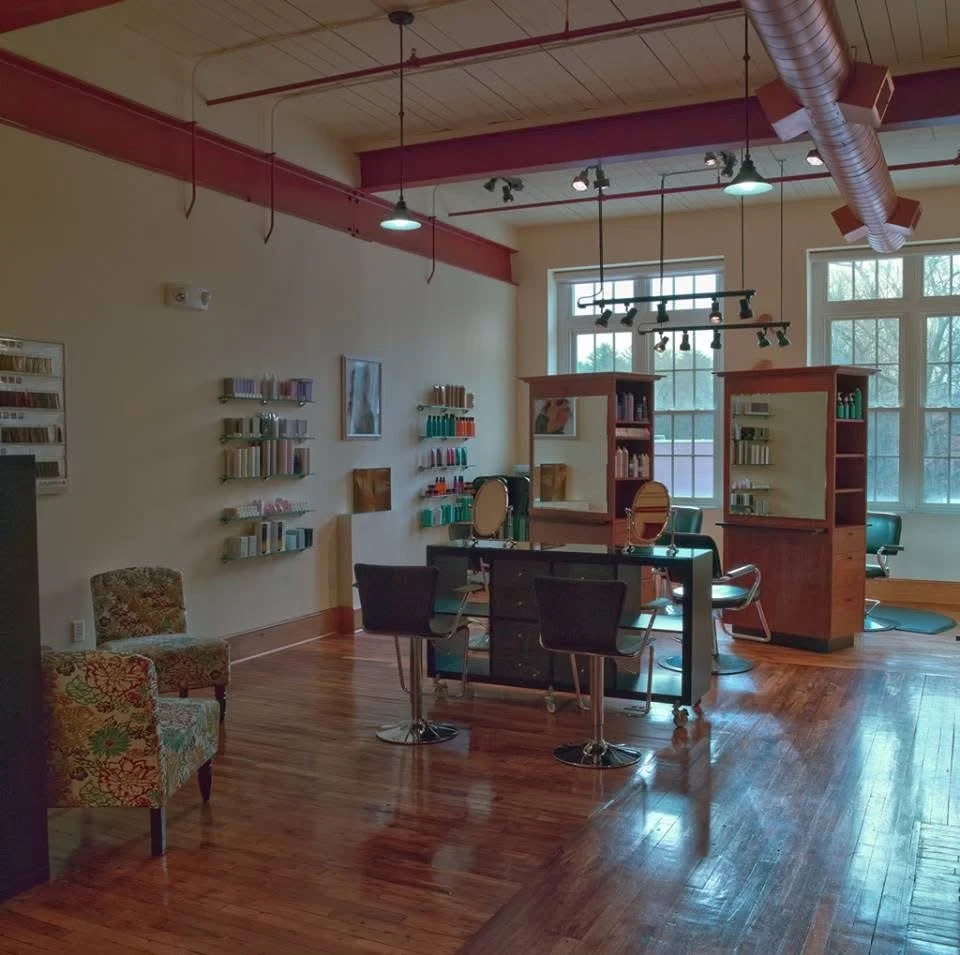 This is an image of the original studio that was expanded with it's original mill wood floors and tall ceilings and steel beams