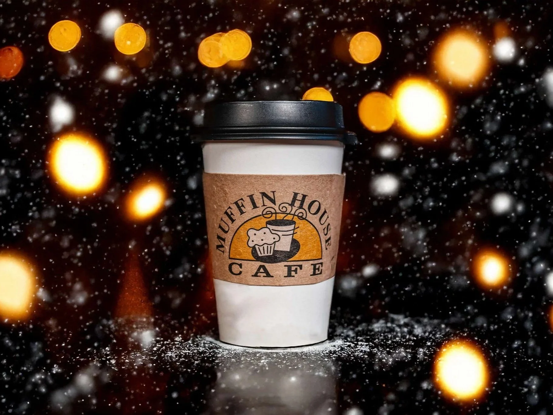 Coffee cup from Muffin House covered in glittering dust for holidays
