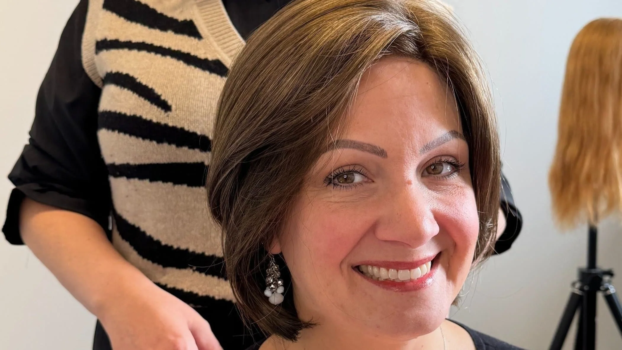 Here is an image of a bLUXE Wig client who bravely shared her experience with us. This brunette wig is so natural looking and comfortable.