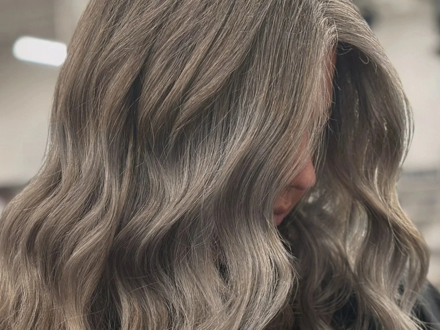 This is an image by bLUXE stylist Hayleigh Todaro. dimensional gray blending highlights