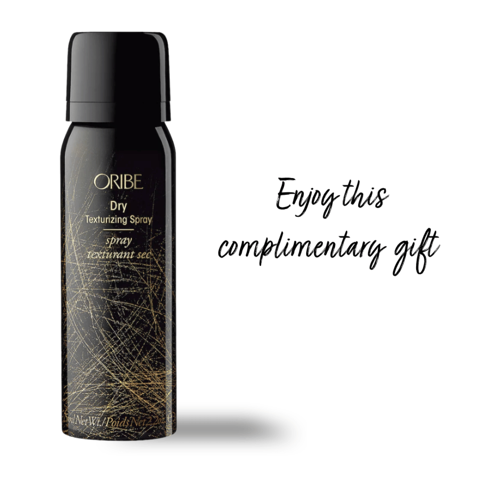 Here is an image of Oribe dry texturizing spray, this month's complimentary gift from bLUXE in a deluxe travel size for your vacations