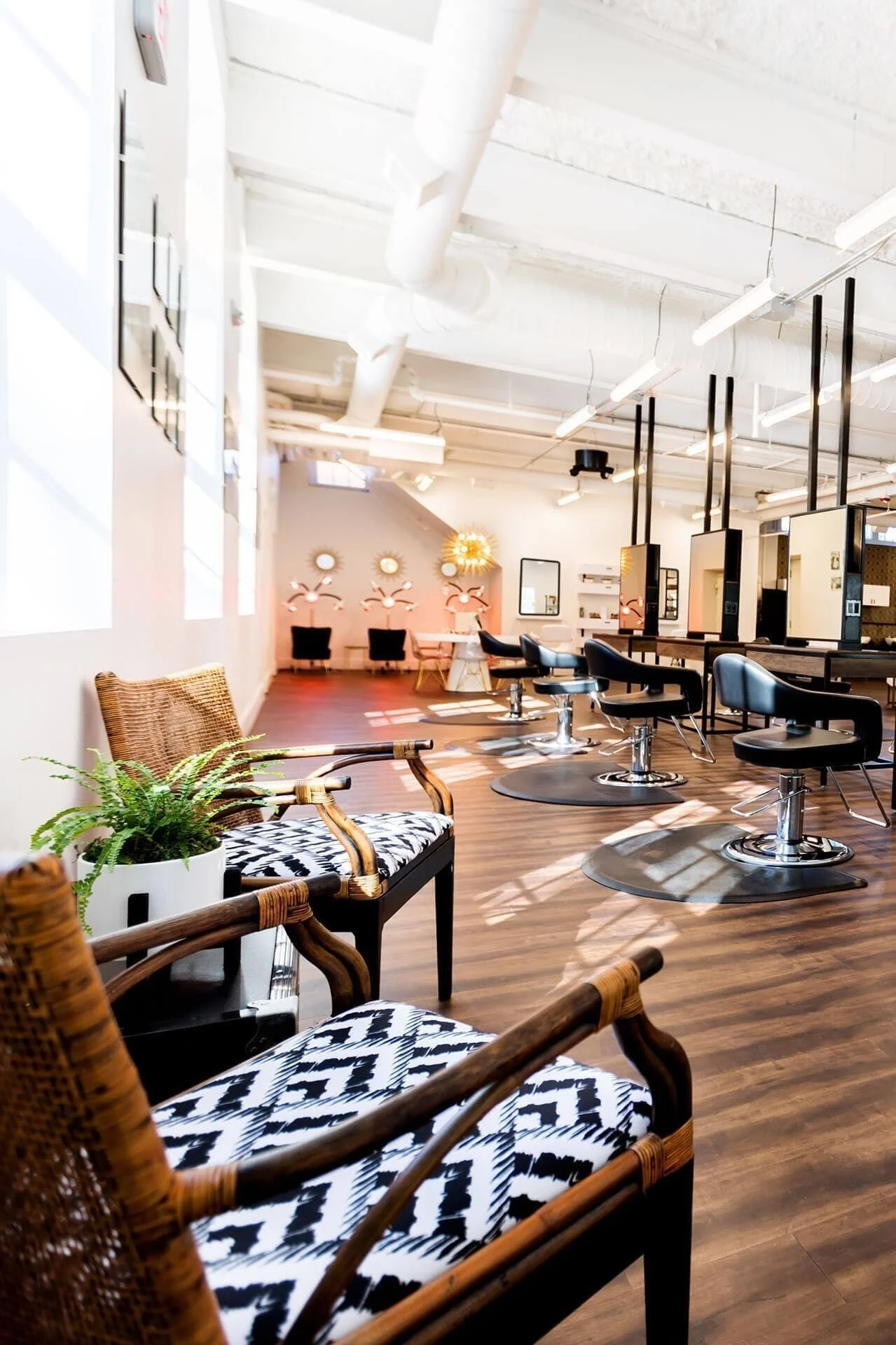 Here is a sunny image of the bLUXE studio in Medway, MA. There are workstations and relaxing resting areas