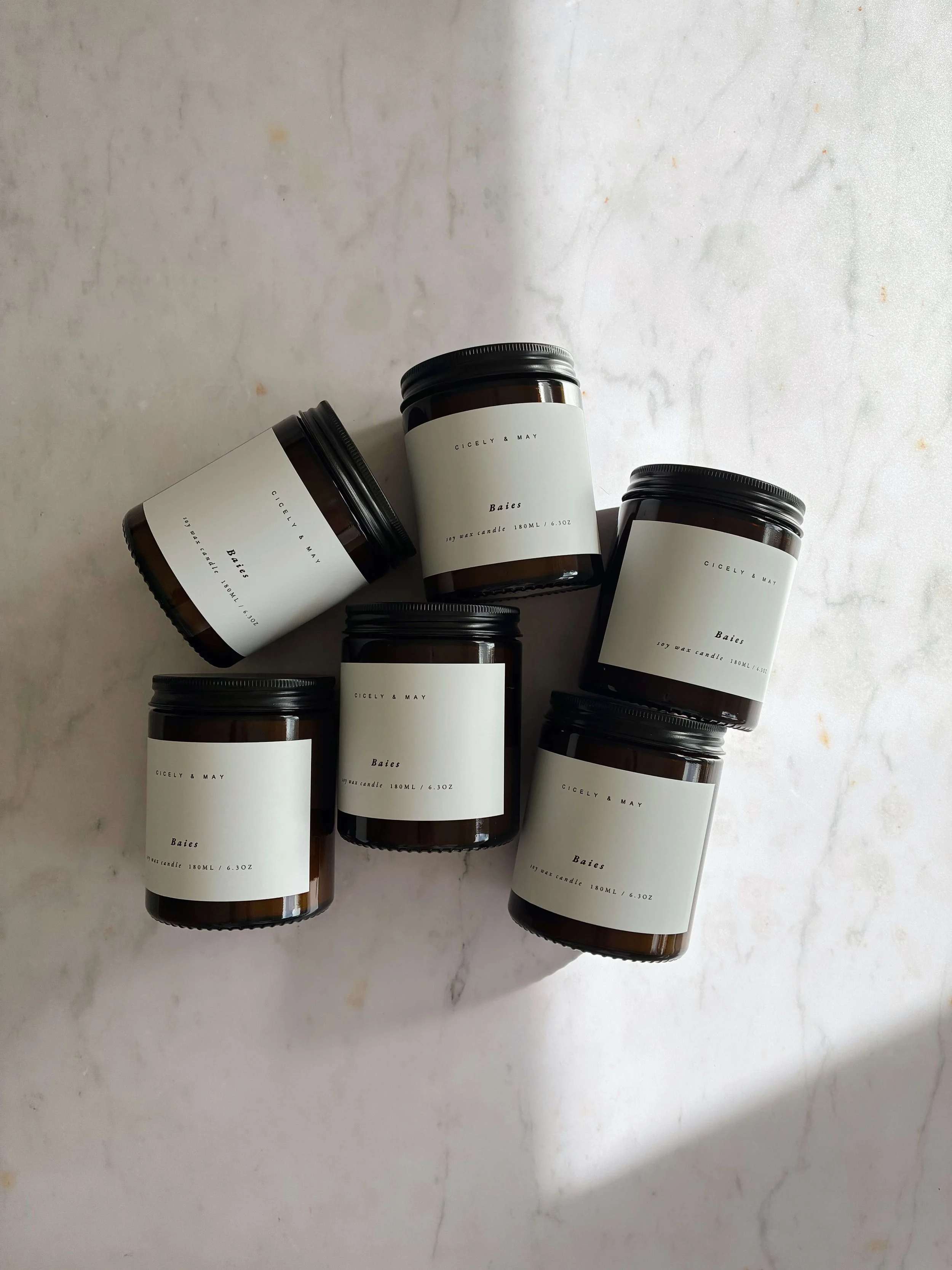 Cicely & May Baies soy candle with blackcurrant, rose and musk fragrance notes.